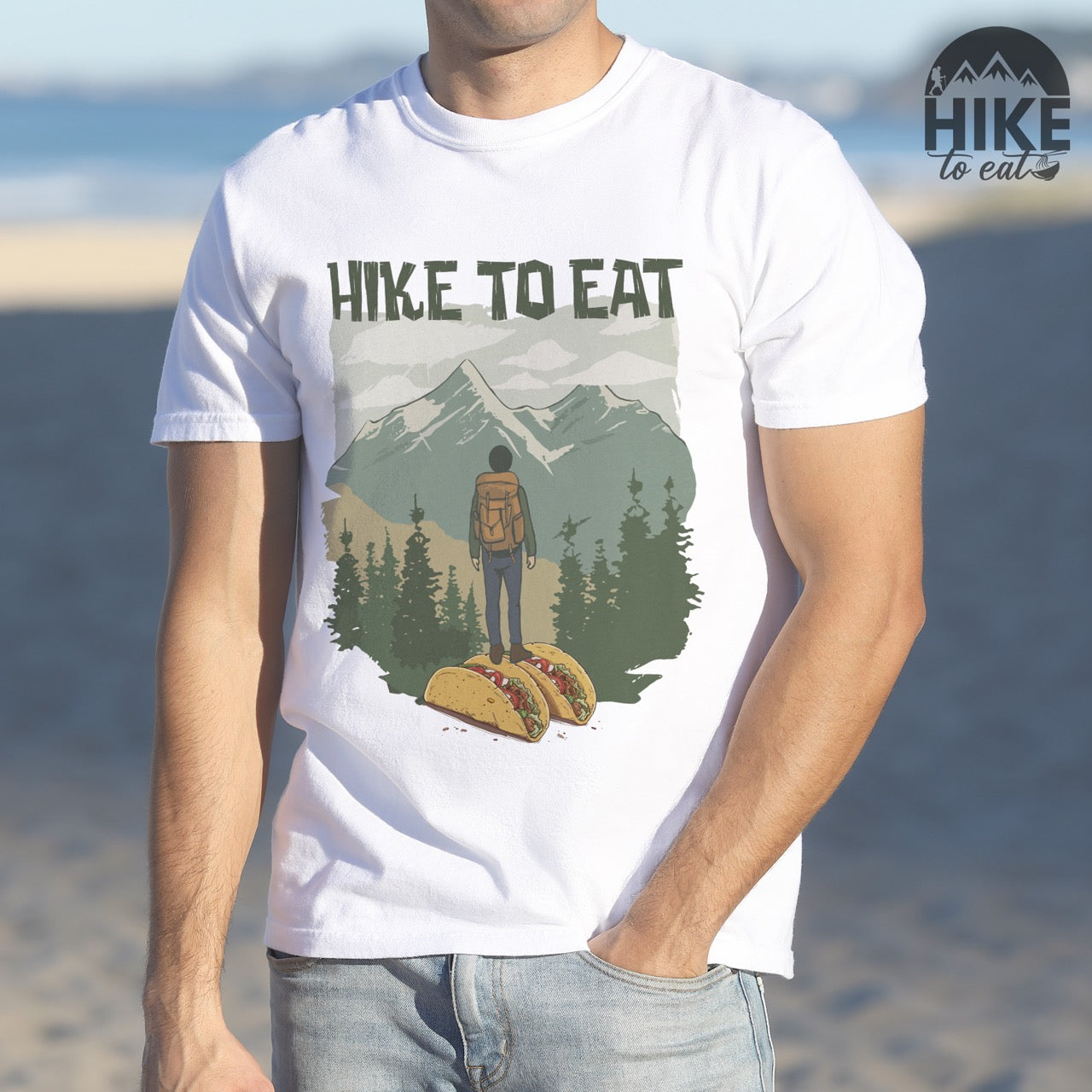 Man wearing white Hike to Eat vintage mountain hiker and taco graphic t-shirt - funny hiking shirt for outdoor adventurers, backpackers, and taco enthusiasts