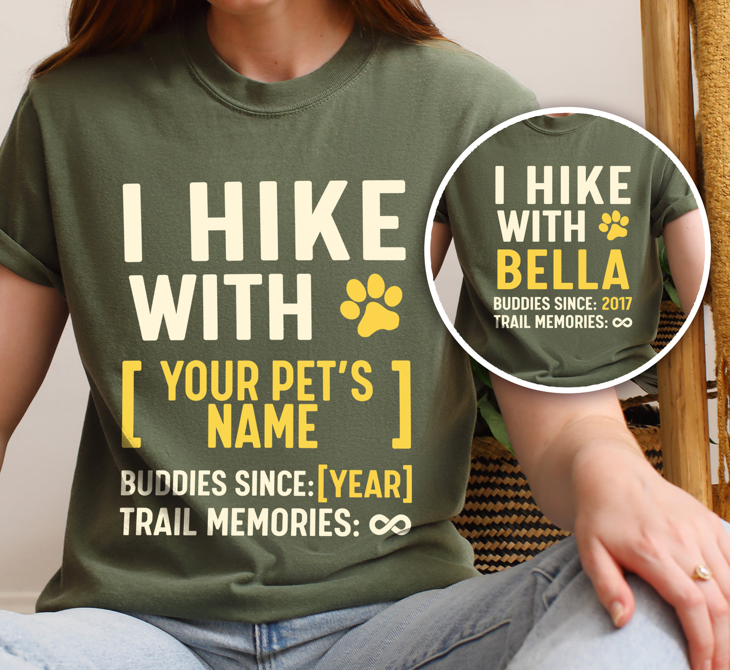 Moss (Dark Green) graphic t-shirt with 'Trail Buddies Personalized' design featuring 'I Hike with' text and customizable pet name field in cream and yellow lettering with paw prints, plus customizable year for 'buddies since' and trail memories infinity.