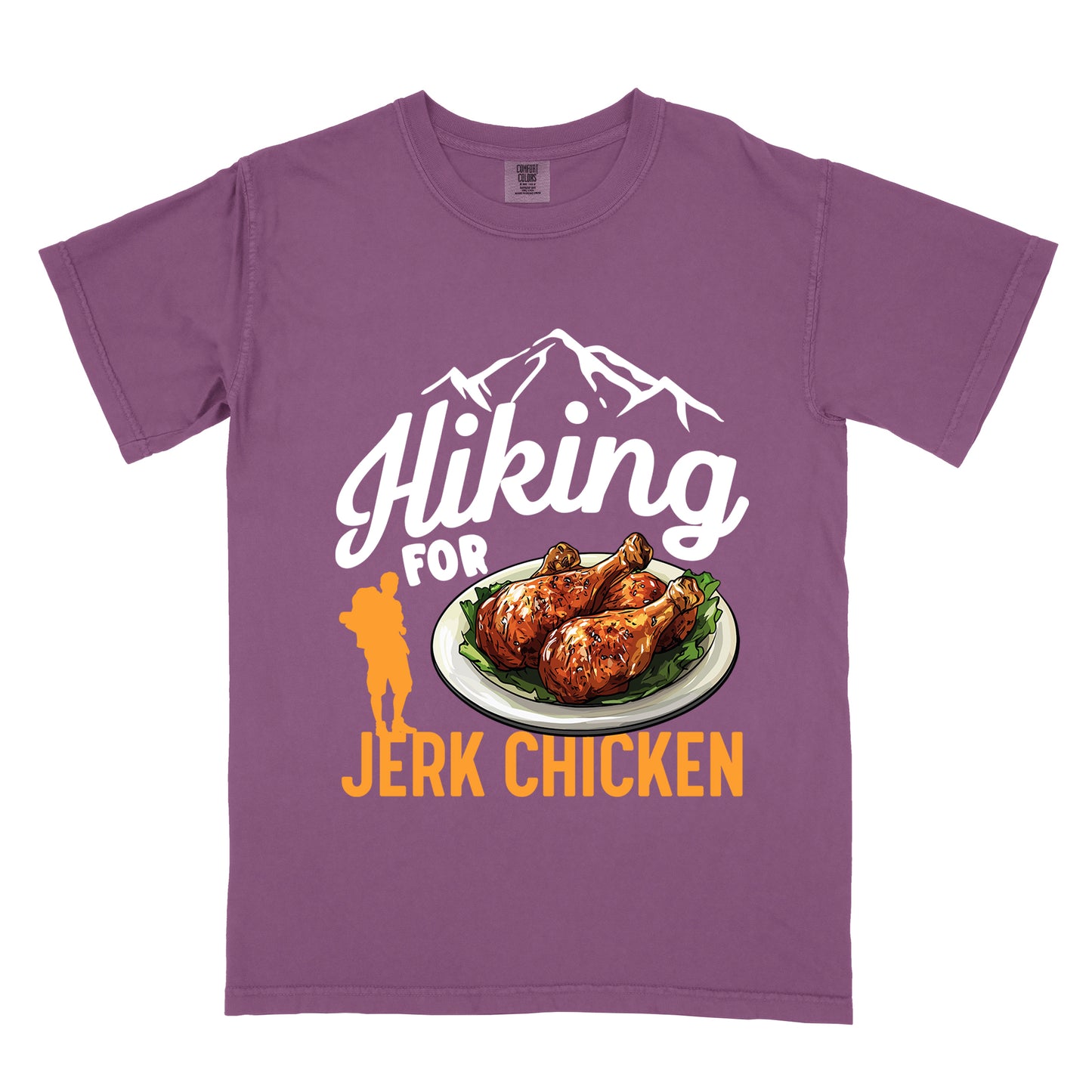 Berry (Dark Violet) t-shirt with white and orange text reading "Hiking FOR JERK CHICKEN". "Hiking" appears in large white script letters at the top with white mountain outlines above it, "FOR" in white text in the middle, and "JERK CHICKEN" in orange at the bottom. Features an illustration of jerk chicken drumsticks on a white plate with green garnish in the center, and a small orange hiker silhouette to the left of the chicken illustration and above the words "JERK CHICKEN".