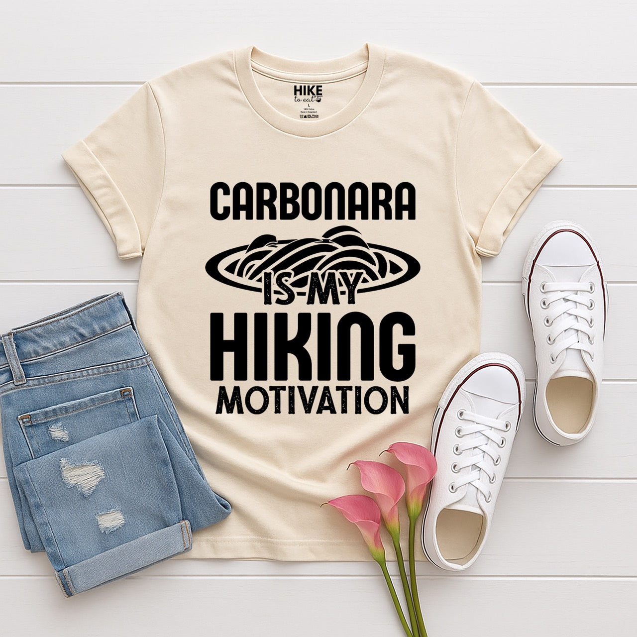 Carbonara is my Hiking Motivation statement tee with bold typography and pasta bowl illustration for carbonara enthusiasts and hikers in natural (beige) with jeans and shoes