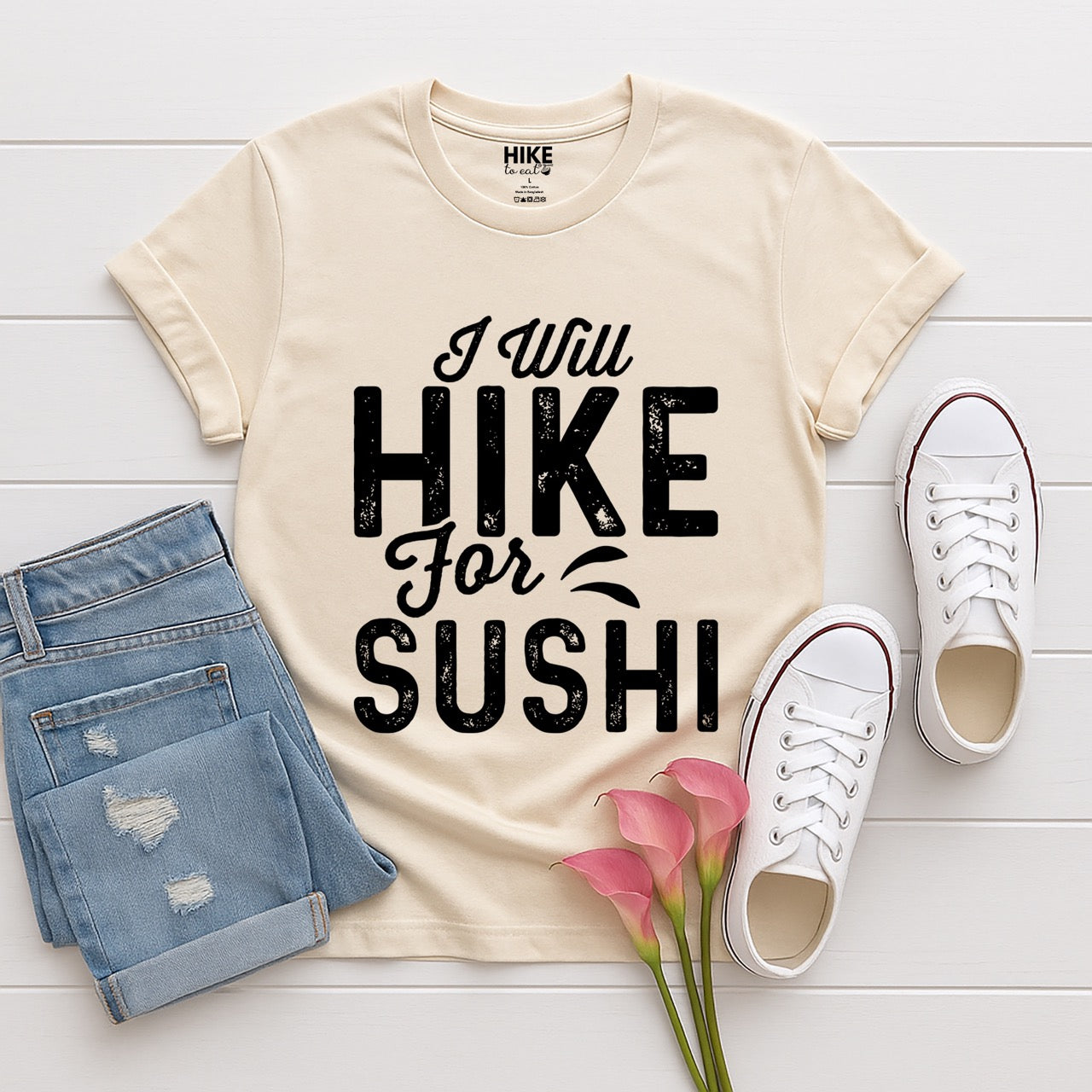 natural (beige) I Will Hike for Sushi statement tee with distressed bold typography and elegant script lettering for Japanese food-loving outdoor enthusiasts and hikers with jeans and shoes