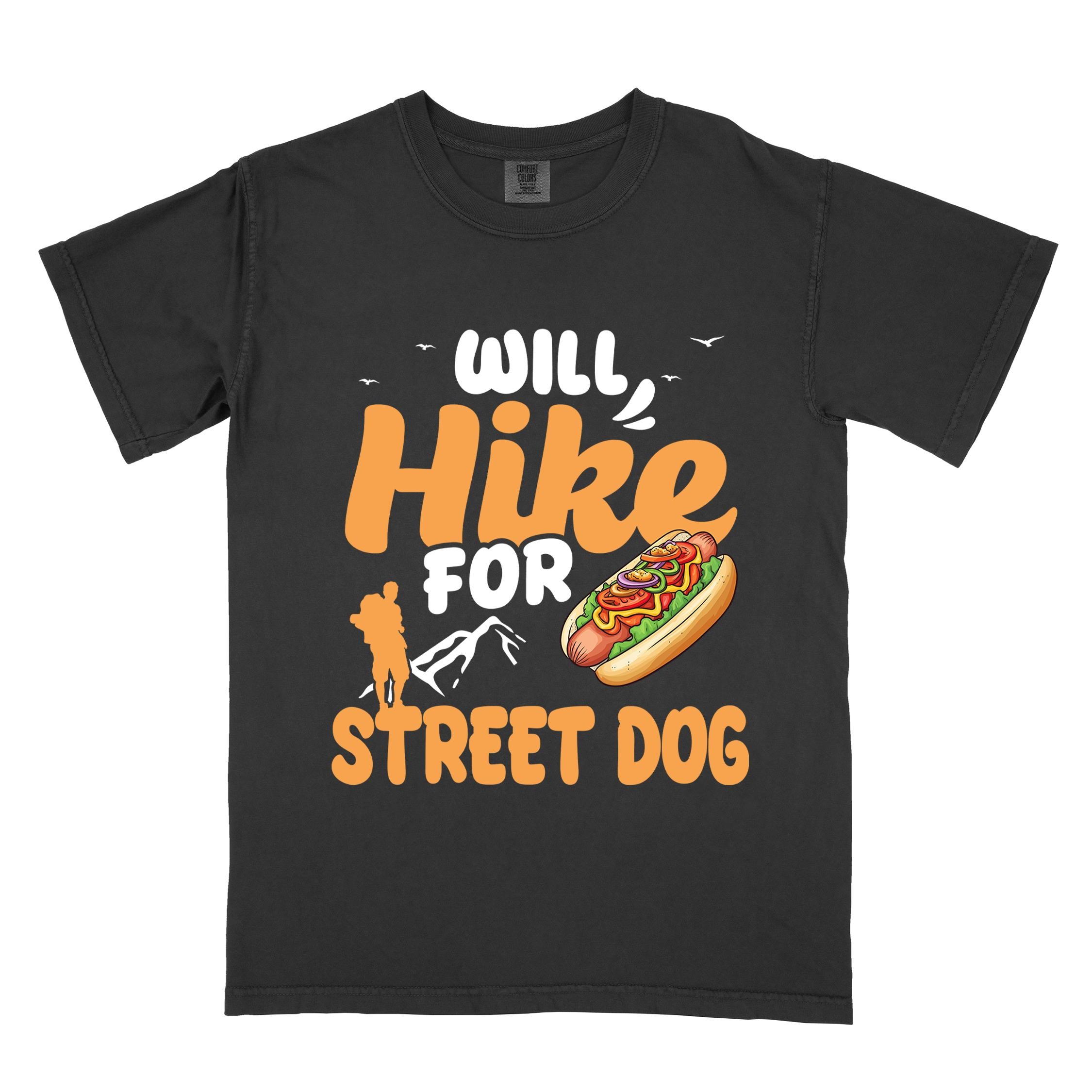 Black "Will hike for street dog" colored vintage tee with bold typography, illustrated freshly bratwurst in a bun, mountains, birds, and backpackers for street dog lovers.