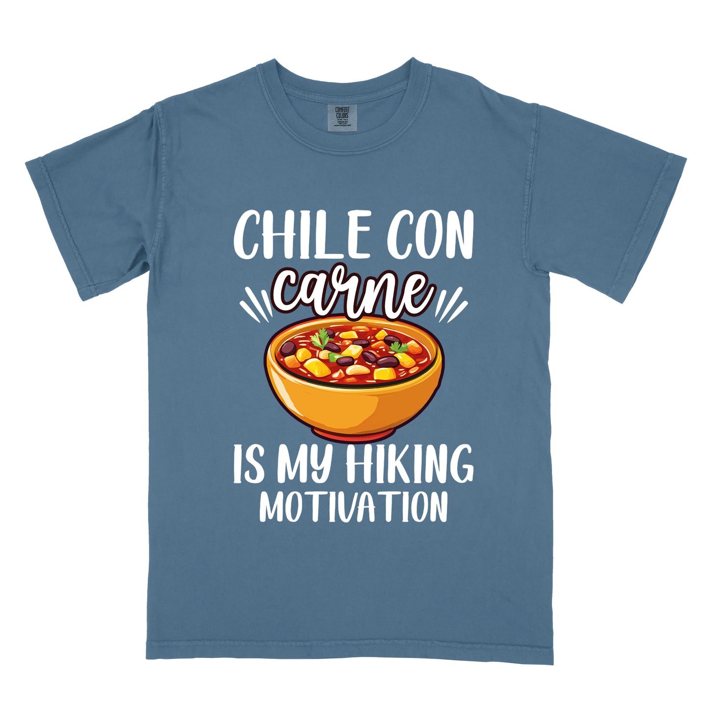 Blue Jean (Denim Blue) t-shirt with white text reading "CHILE CON carne IS MY HIKING MOTIVATION." The word "carne" appears in stylized script. In the center is a colorful illustration of a bowl of chili con carne showing beans, meat, corn, and vegetables in an orange bowl.