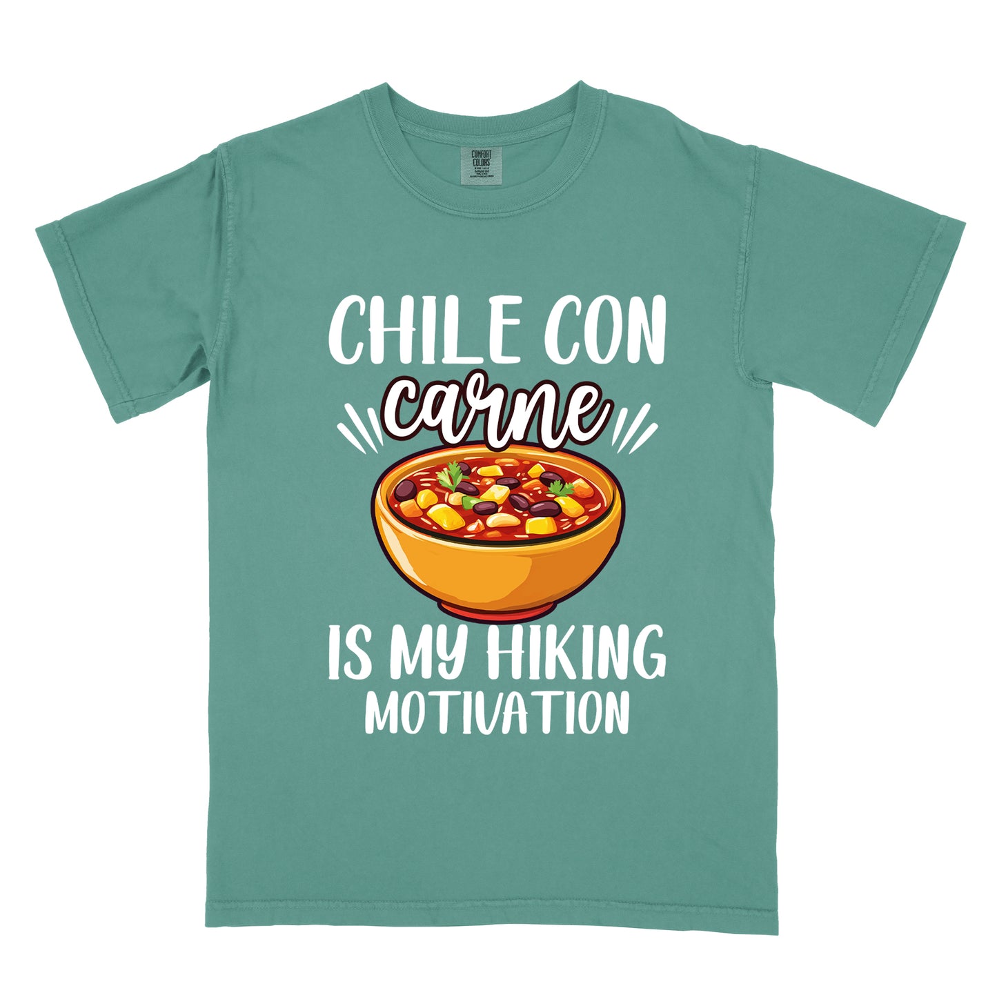 Light Green t-shirt with white text reading "CHILE CON carne IS MY HIKING MOTIVATION." The word "carne" appears in stylized script. In the center is a colorful illustration of a bowl of chili con carne showing beans, meat, corn, and vegetables in an orange bowl.