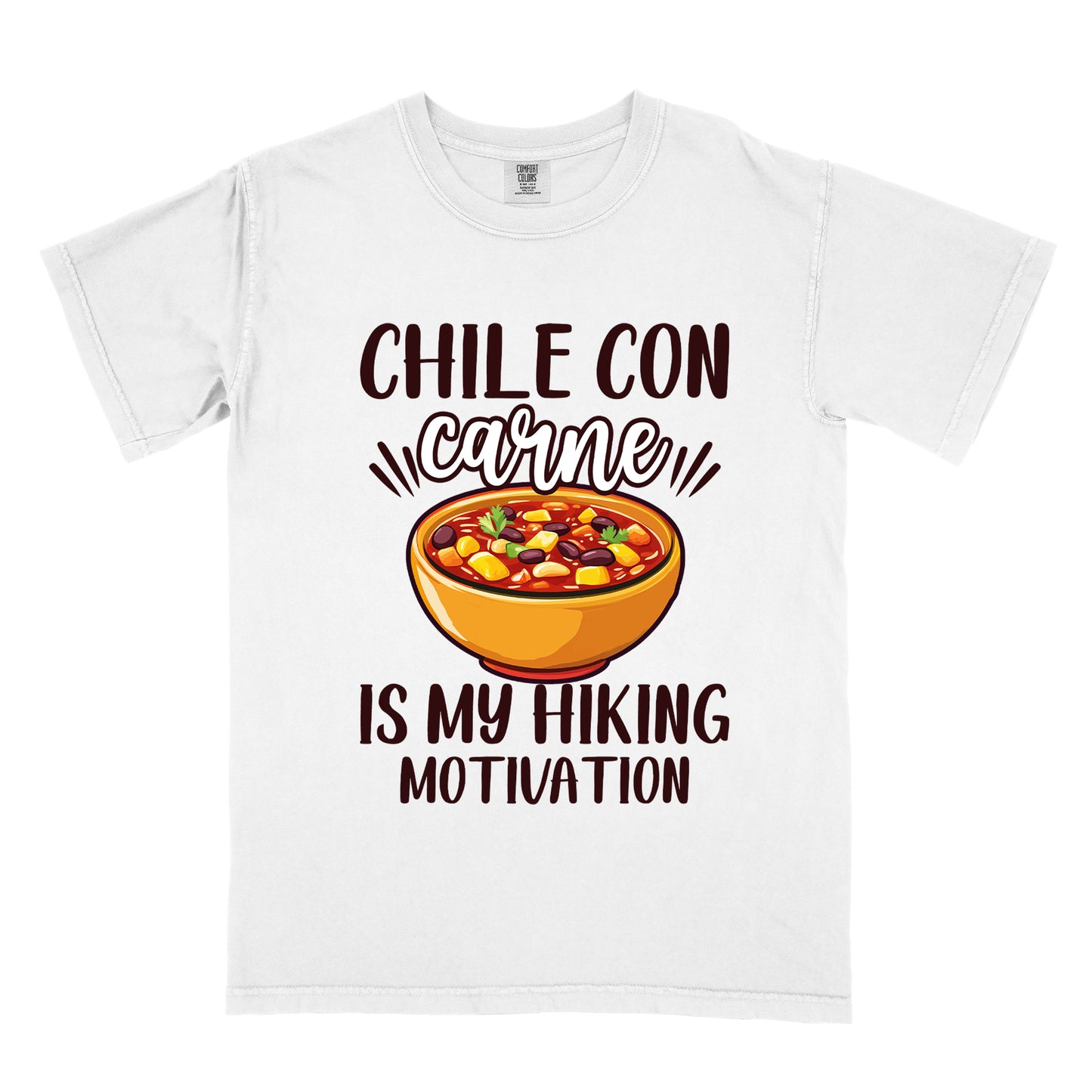 White t-shirt with black text reading "CHILE CON carne IS MY HIKING MOTIVATION." The word "carne" appears in stylized script. In the center is a colorful illustration of a bowl of chili con carne showing beans, meat, corn, and vegetables in an orange bowl.