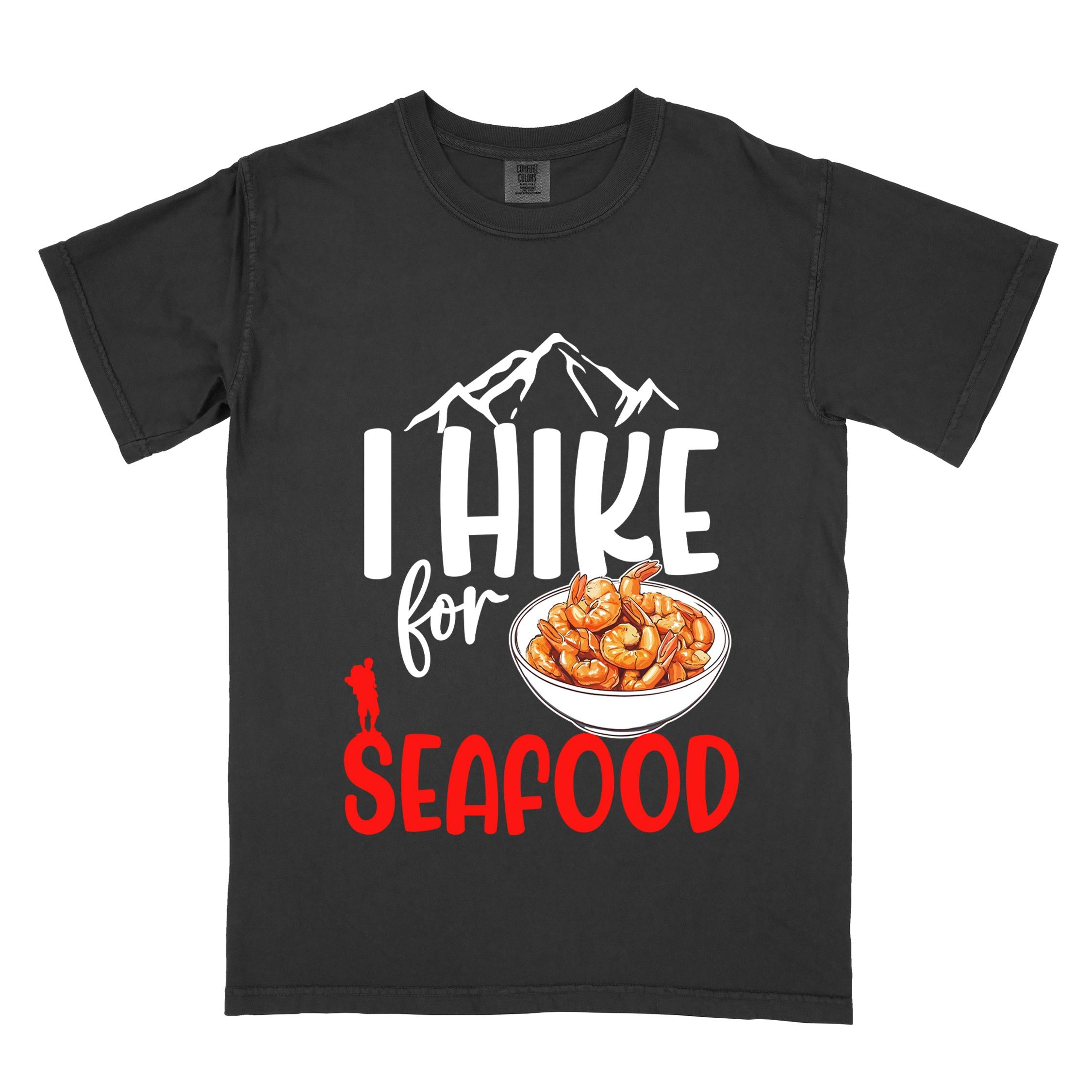 Black "I hike for seafood" colored vintage tee with bold typography, illustrated shrimps on a bowl, mountains, birds, and backpackers for seafood lovers.
