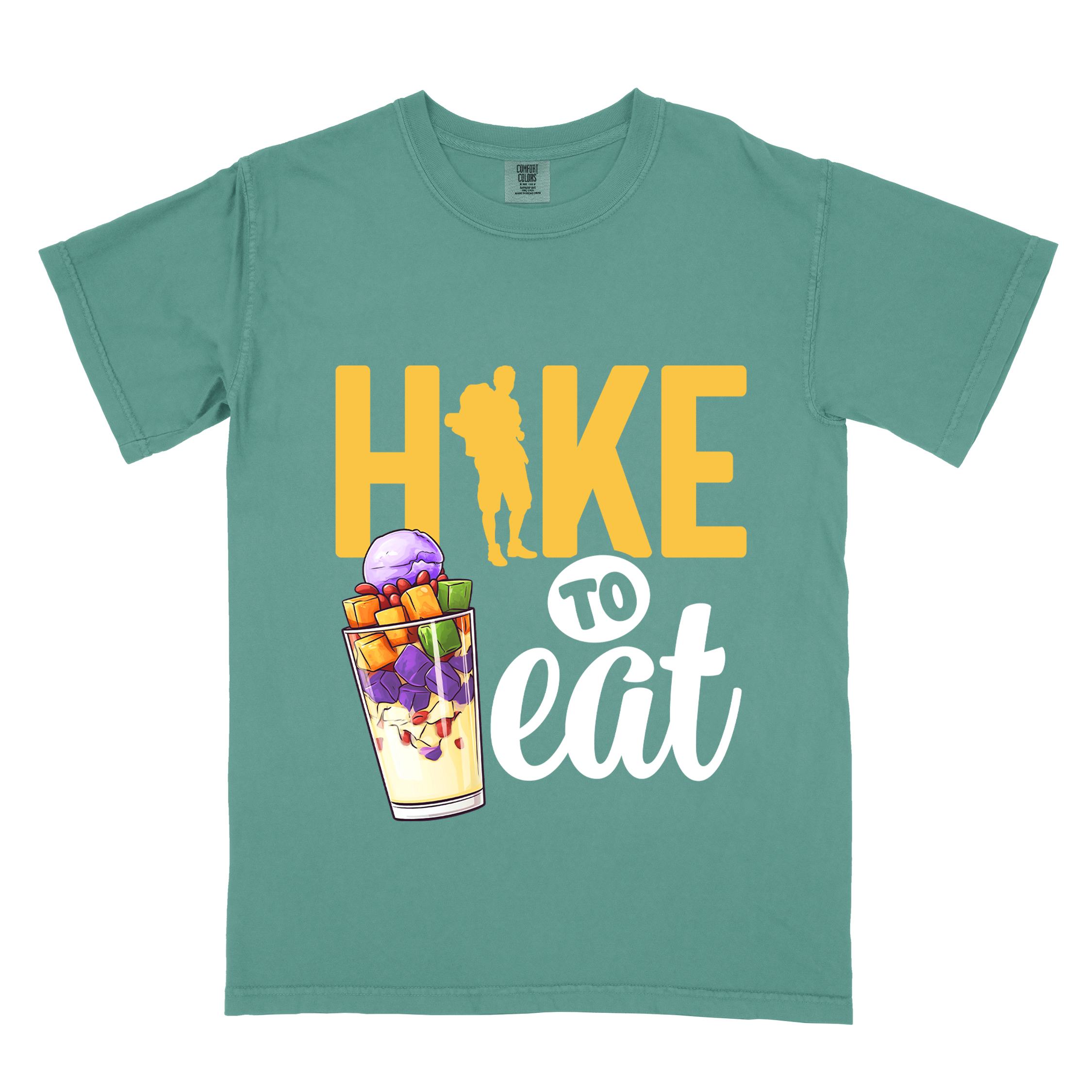 Light green "hike to eat" colored vintage tee with bold typography, illustrated halo-halo dessert, and backpackers for iced dessert lovers.