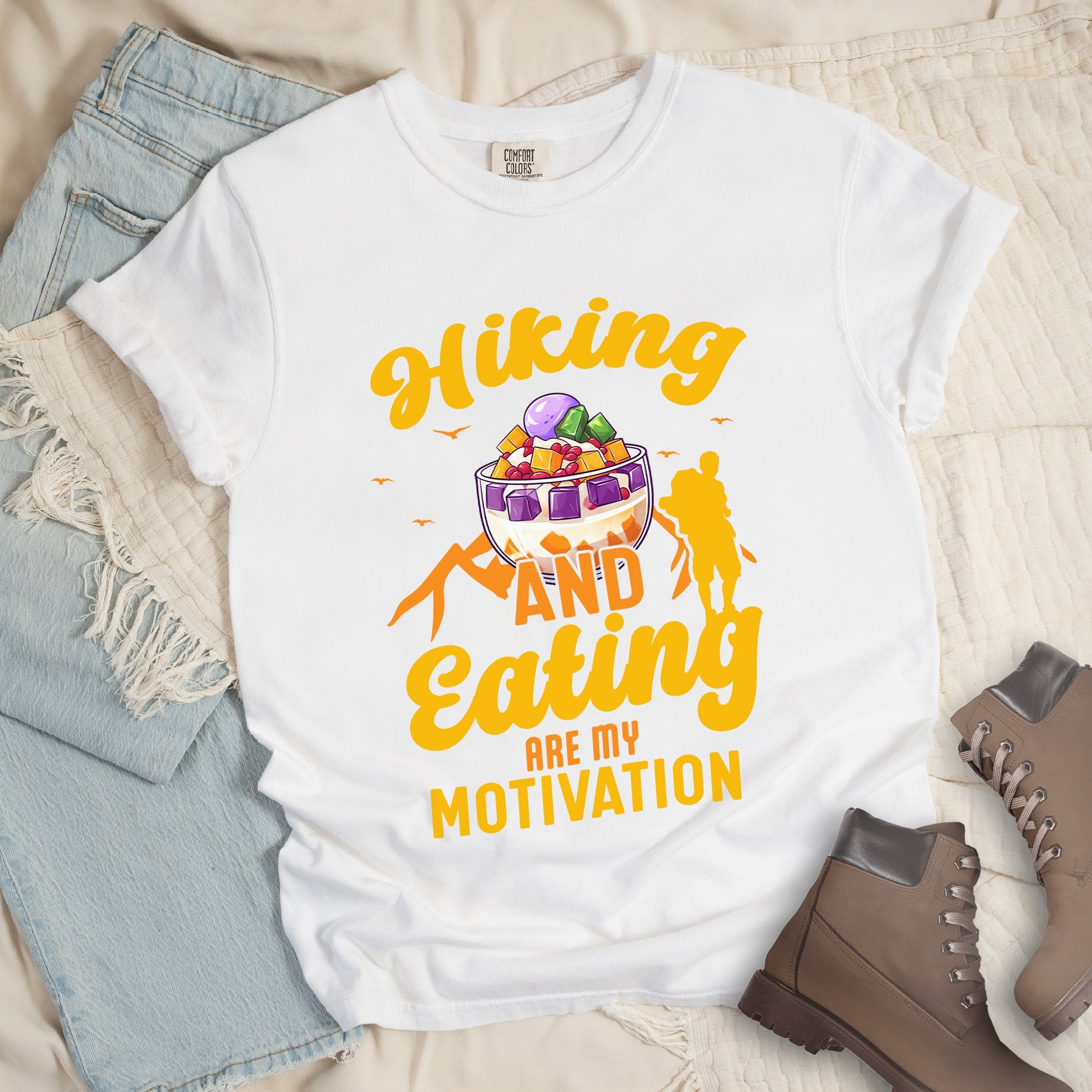 White shirt with Hiking Design featuring the phrase “Hiking and Eating Are My Motivation” and an illustration of halo-halo in a bowl.