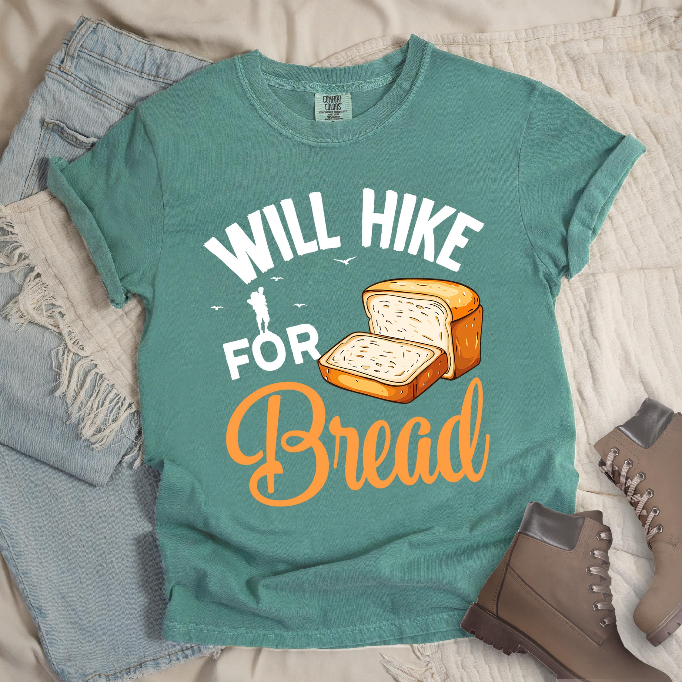 Green shirt with Hiking Design featuring the phrase “Will Hike for Bread” and an illustration of sliced bread loaves.
