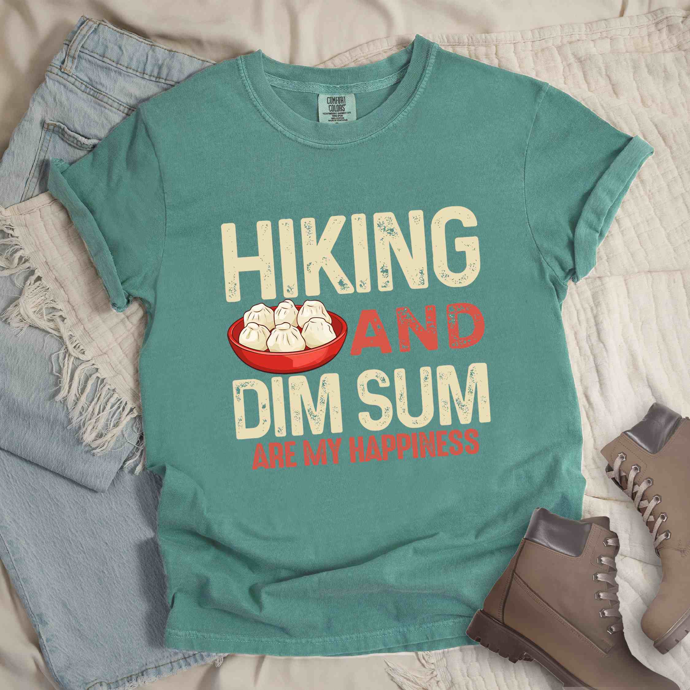 Light green "Hiking and dim sum are my happiness" colored statement tee with bold typography, and steamed dim sum illustration for dim sum-loving outdoor enthusiasts, hikers and foodies