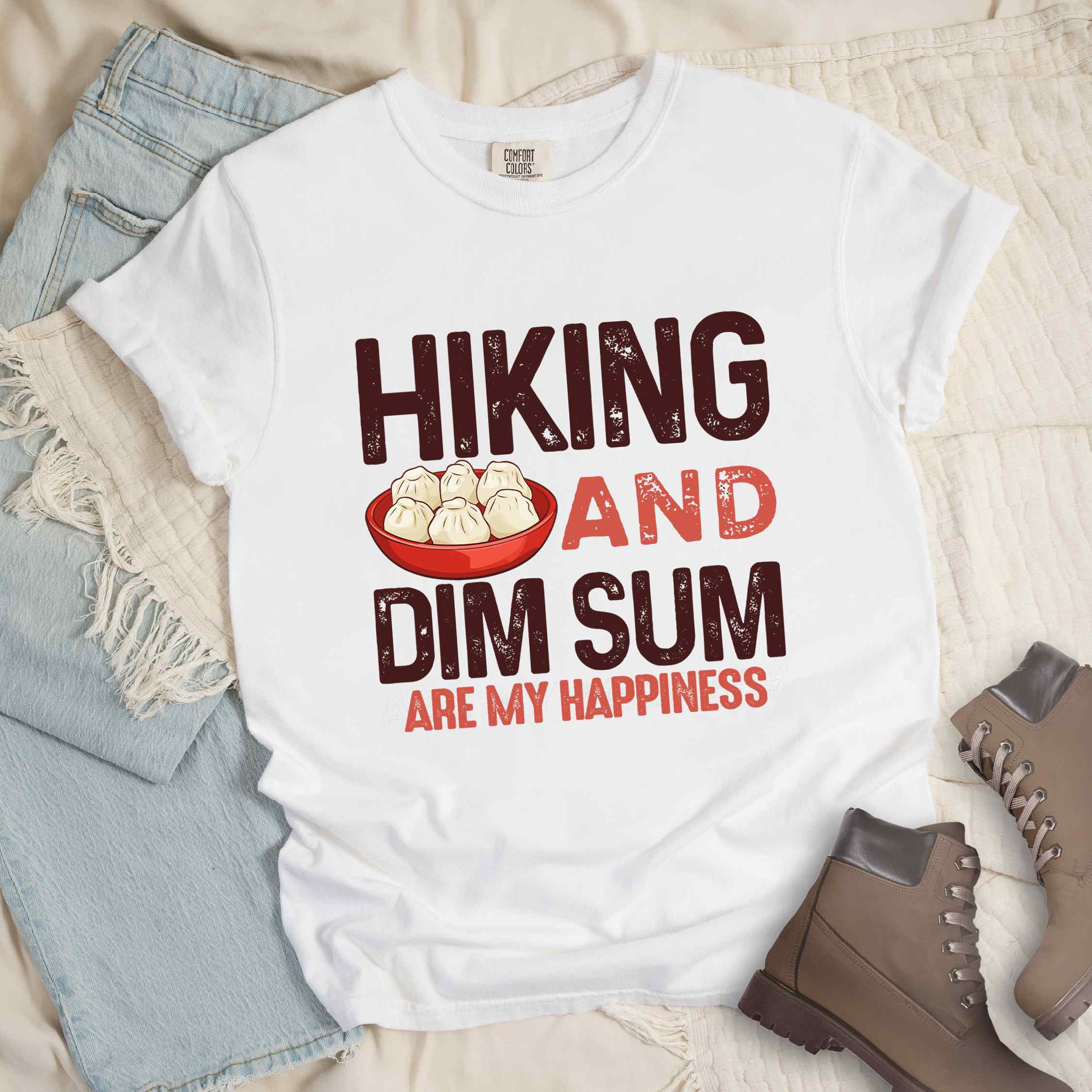 White "Hiking and dim sum are my happiness" colored statement tee with bold typography, and steamed dim sum illustration for dim sum-loving outdoor enthusiasts, hikers and foodies