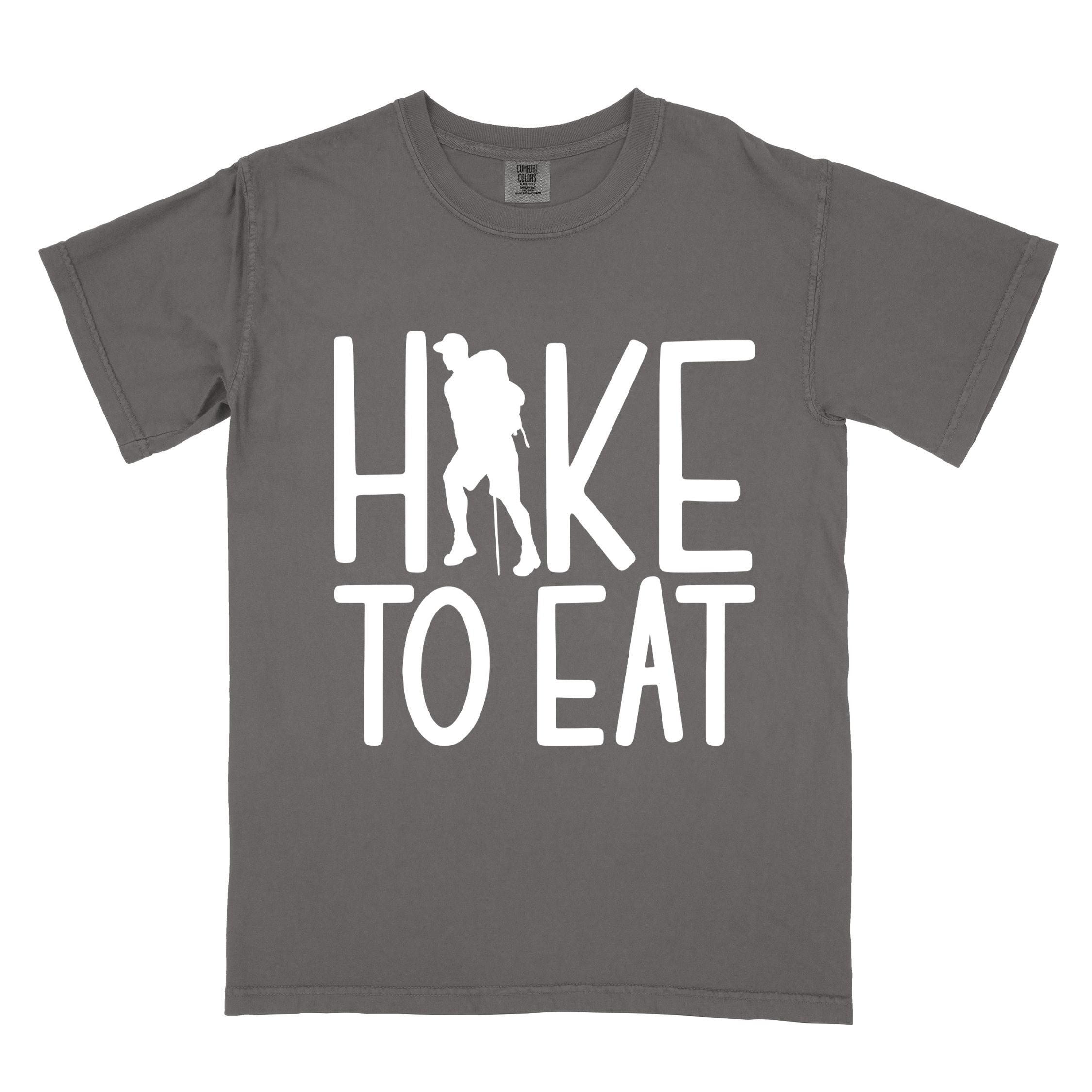Pepper "Hike to Eat" colored statement tee with bold typography, perfect for food motivated individuals.