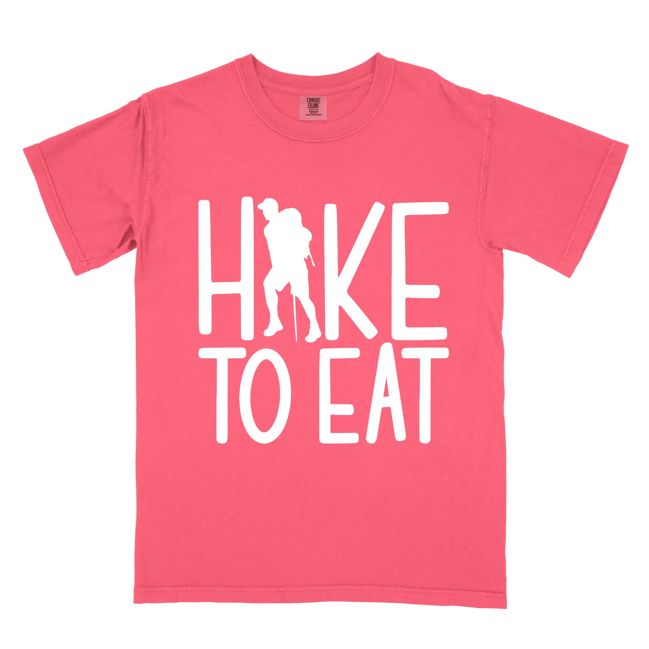 Watermelon "Hike to Eat" colored statement tee with bold typography, perfect for food motivated individuals.
