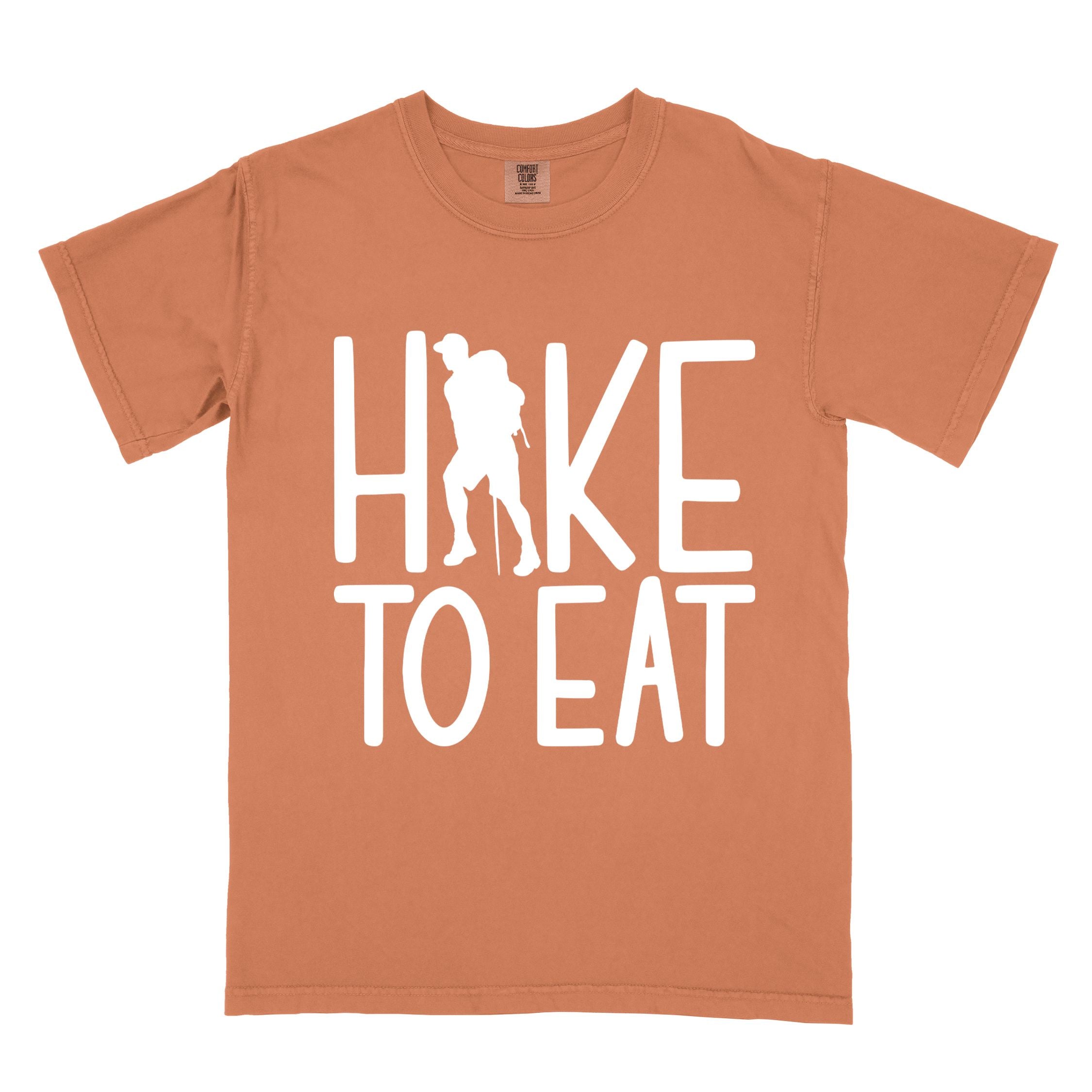 Yam "Hike to Eat" colored statement tee with bold typography, perfect for food motivated individuals.