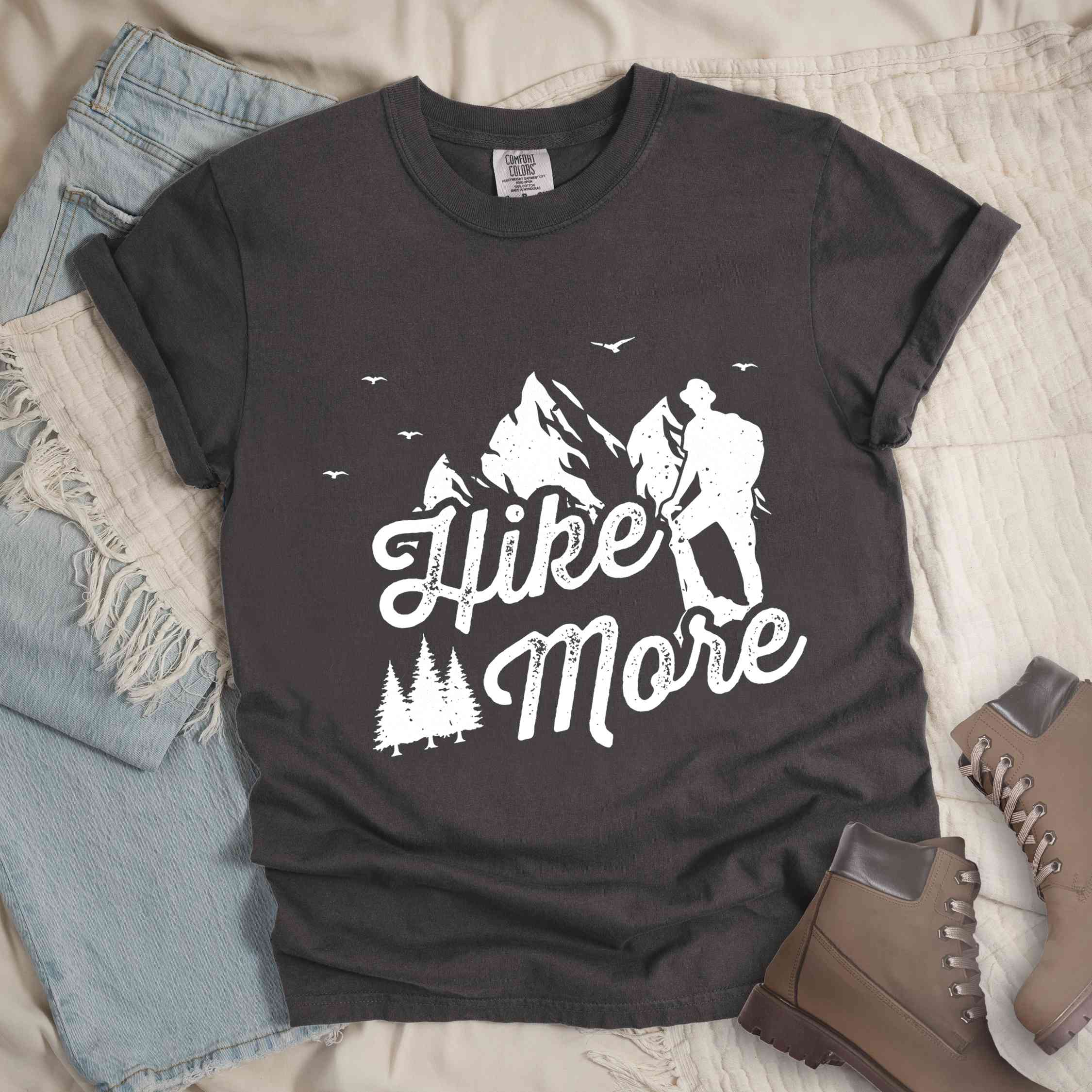 Pepper "Hike More" colored statement tee with bold typography, mountains, birds, perfect for food motivated individuals.