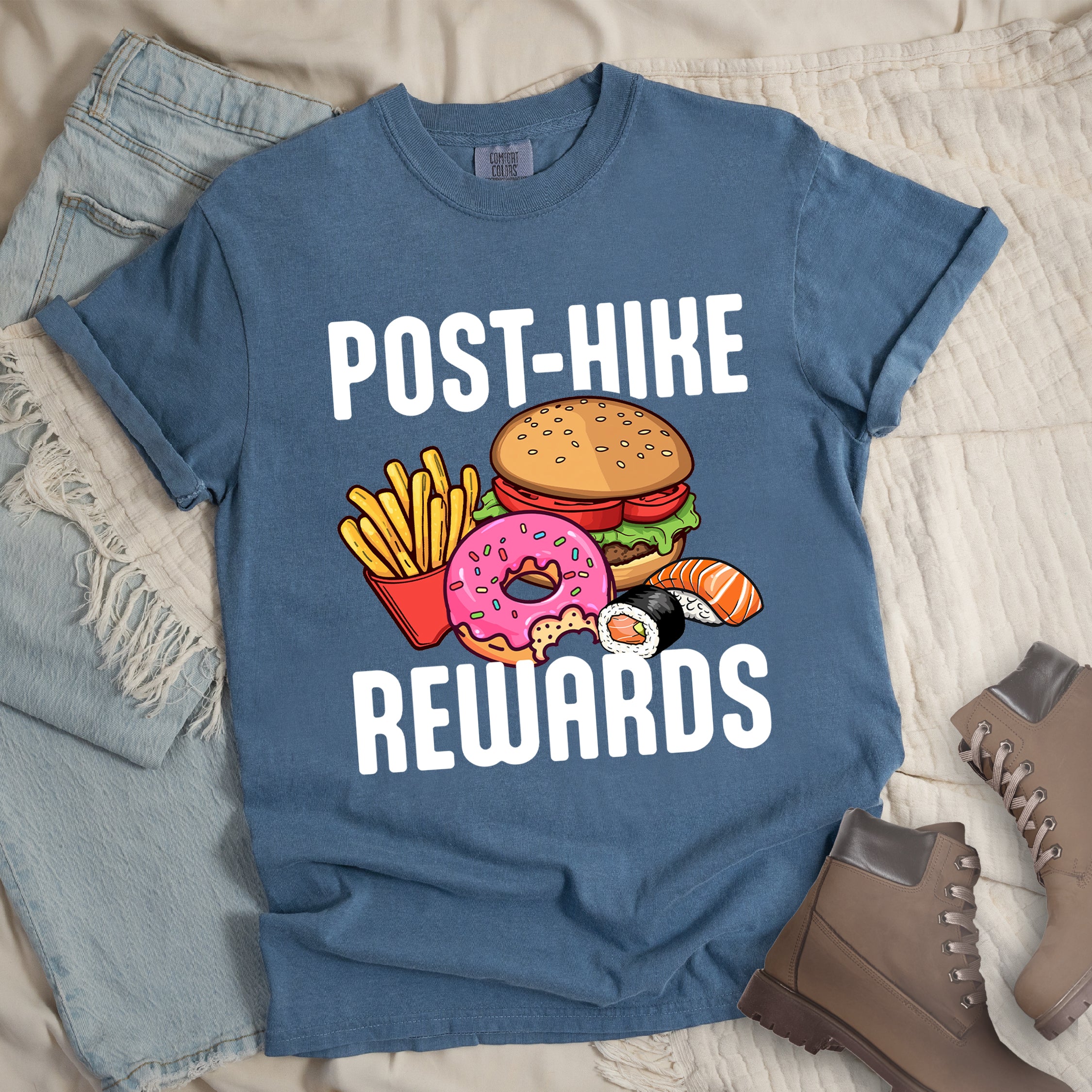 Blue Jean (Denim Blue) colored hiking shirt displaying white POST-HIKE REWARDS text with colorful burger, french fries, donut, and sushi illustrations