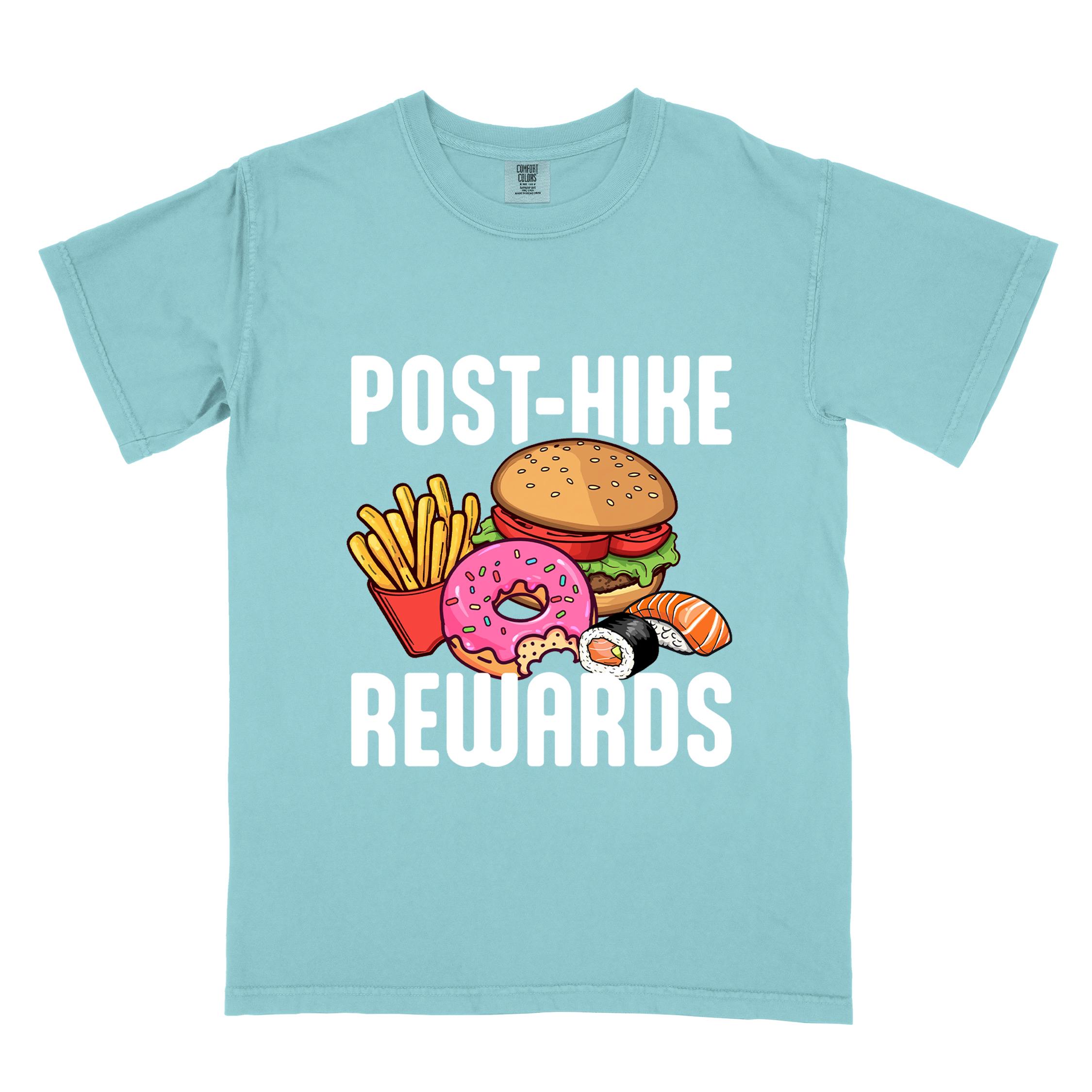 Chalky mint "Post-hike rewards" colored statement tee with bold typography, mountains, birds, illustrated fast food meal, perfect for adventure motivated individuals and looking for post-hike meal.