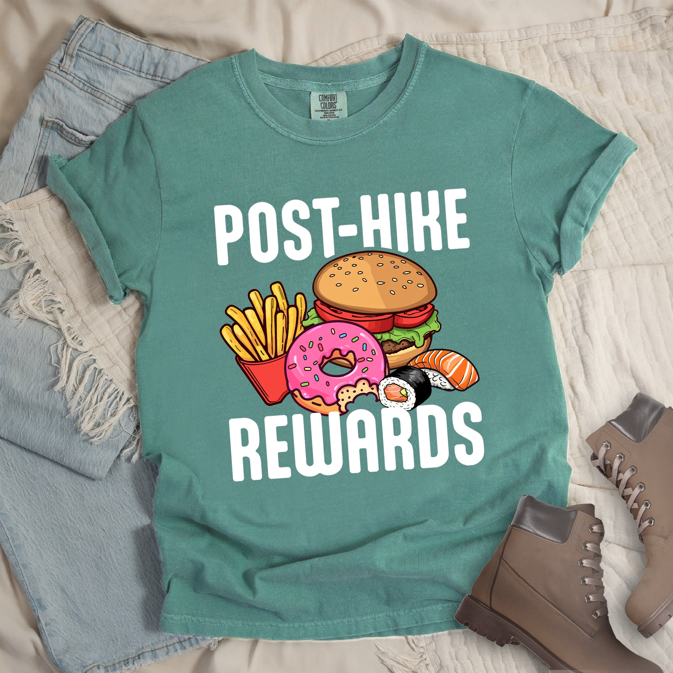 Light Green colored hiking shirt displaying white POST-HIKE REWARDS text with colorful burger, french fries, donut, and sushi illustrations