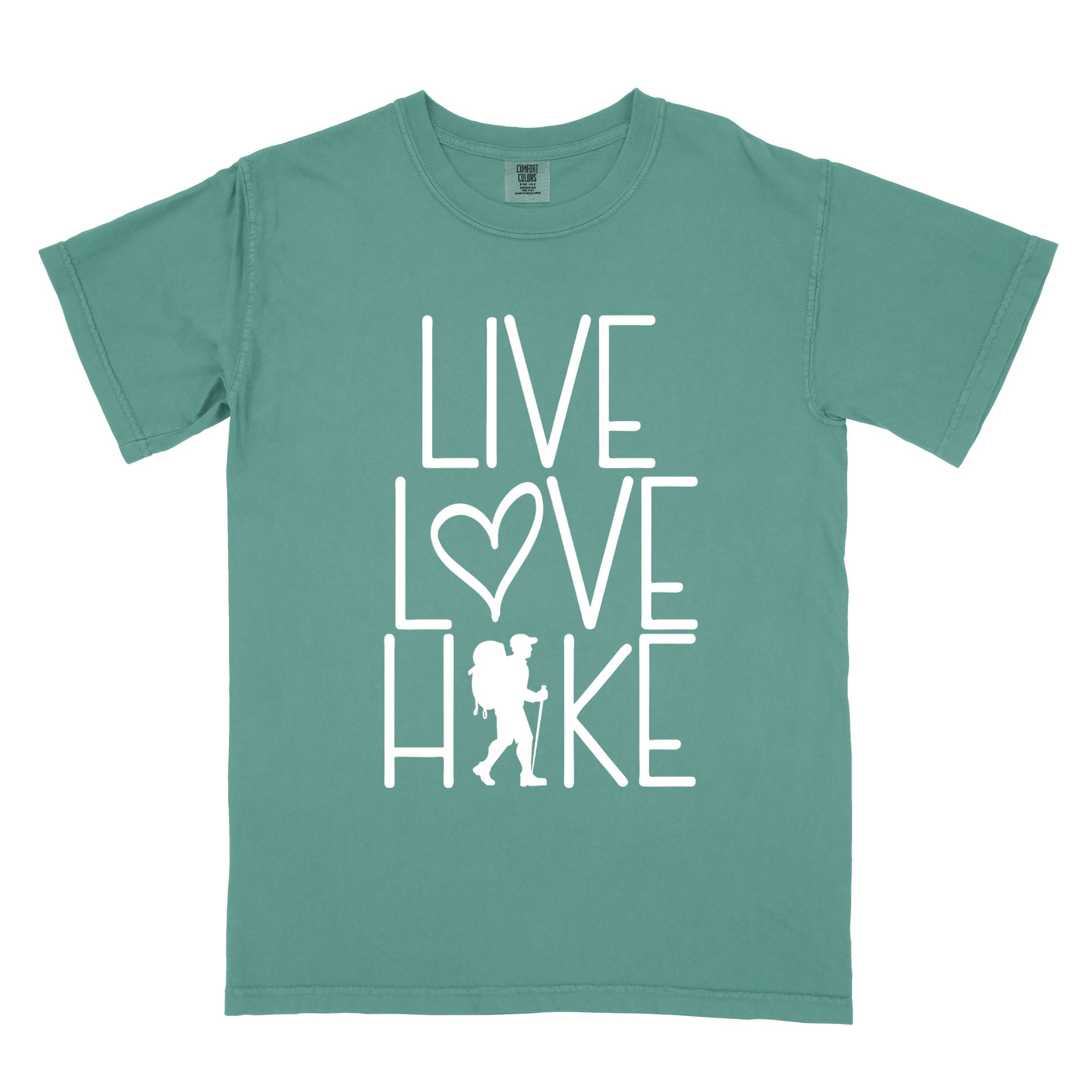 Light green "Live Love hike" colored statement tee with bold typography, perfect for adventure motivated individuals.