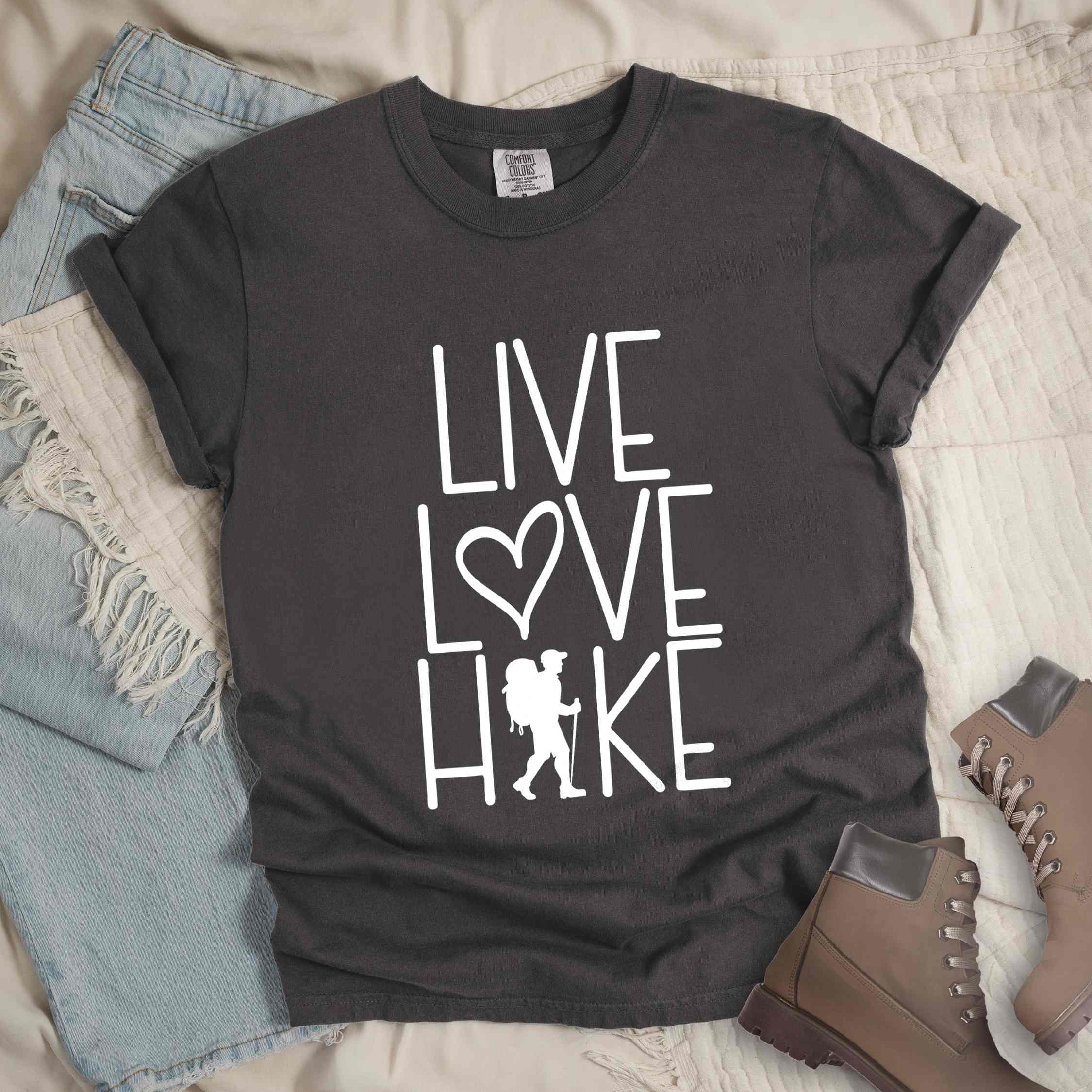 Pepper "Live Love hike" colored statement tee with bold typography, perfect for adventure motivated individuals.