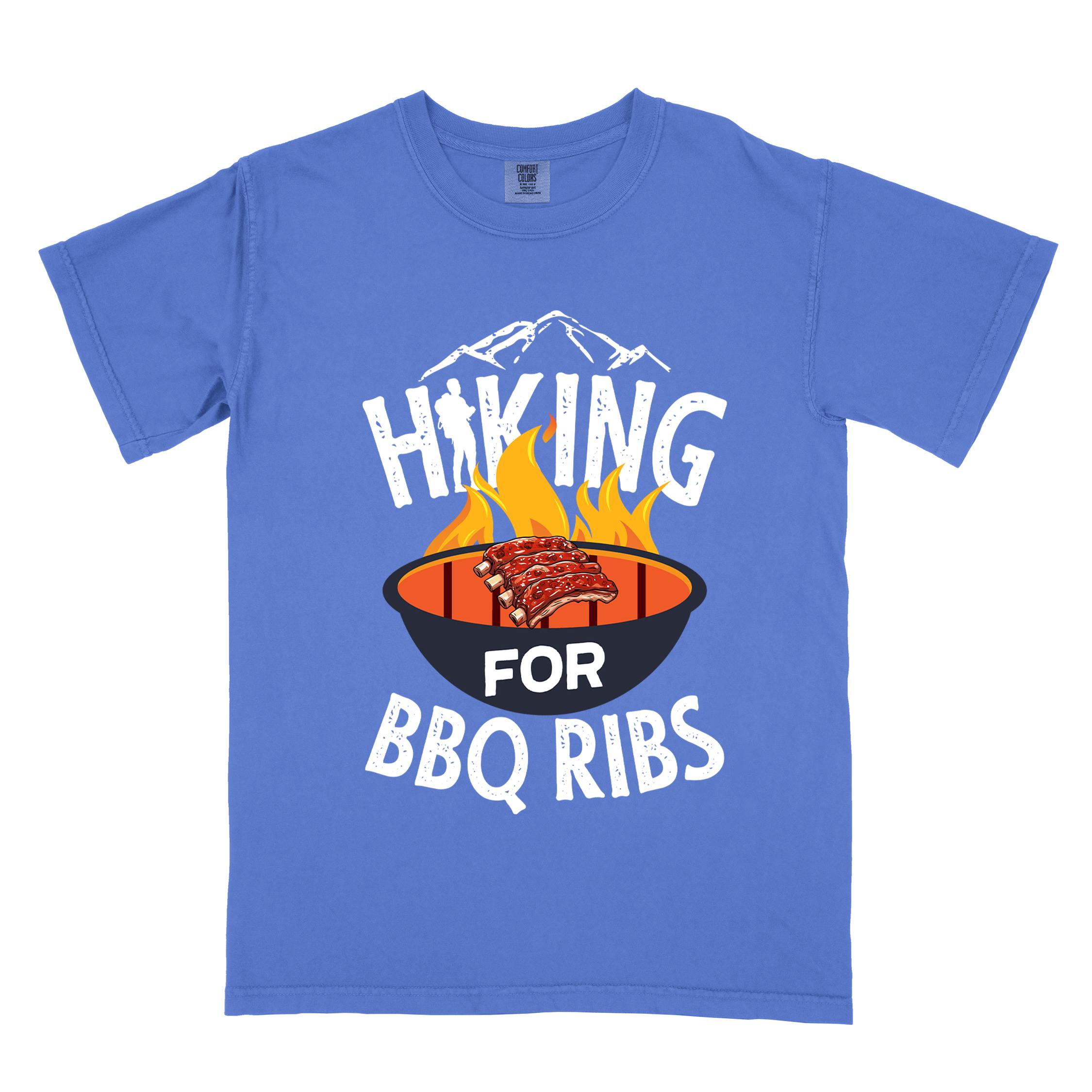Flo blue Hiking for BBQ ribs colored vintage tee with bold typography, illustrated grilling bbq ribs, mountains, birds, and bbq enthusiasts