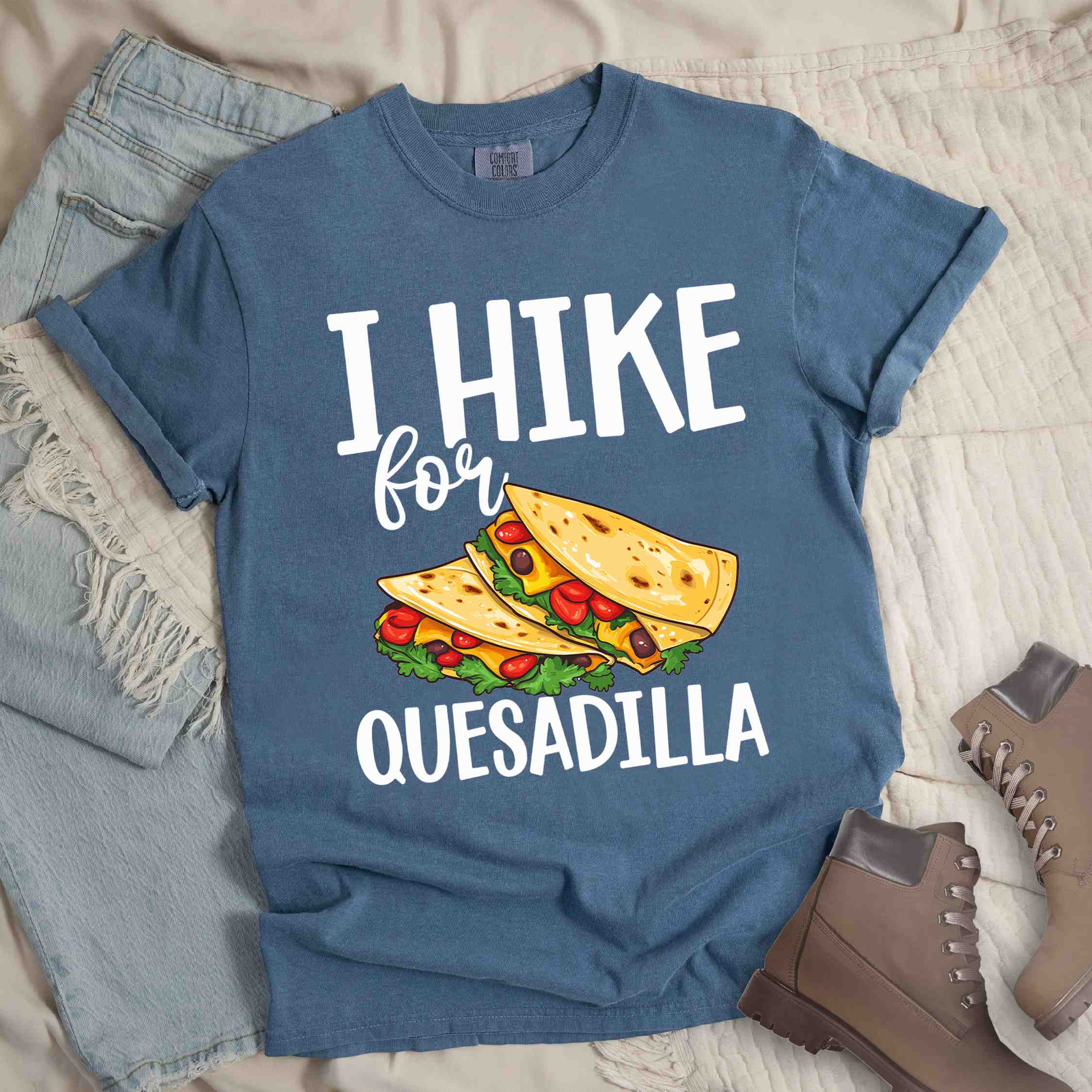 Blue jean I Hike for Quesadilla colored vintage tee with bold typography, illustrated quesadilla wrap for backpackers with the craving for quesadillas