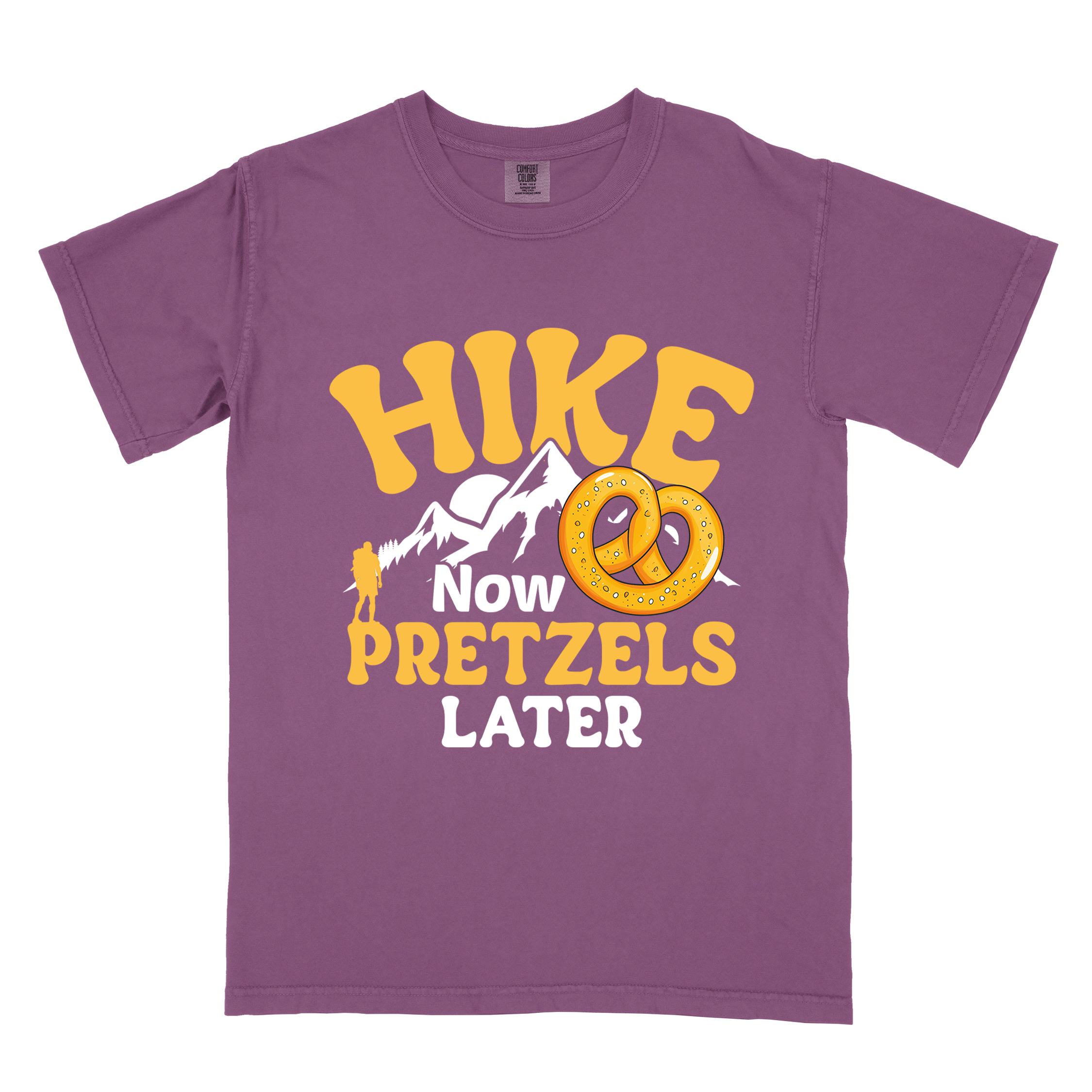 Berry Hike now Pretzels later colored vintage tee with bold typography, , mountains, sunrise, and illustrated pretzel for baked pretzel lovers