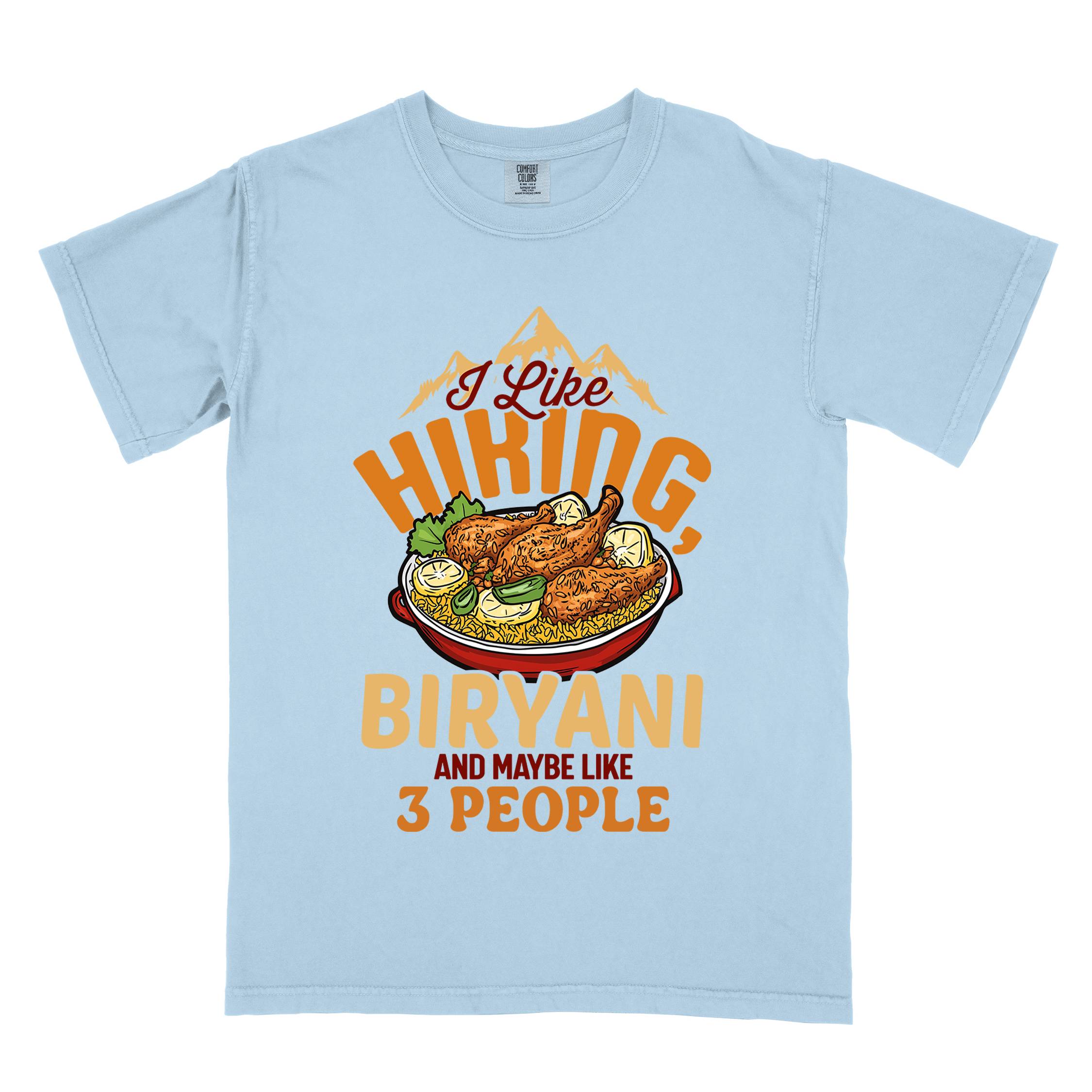 Chambray “I Like Hiking, Biryani and Maybe Like 3 People” colored vintage tee with bold text, featuring a steaming bowl of biryani with chicken, lemon wedges, and herbs. Perfect tee for biryani rice lovers.