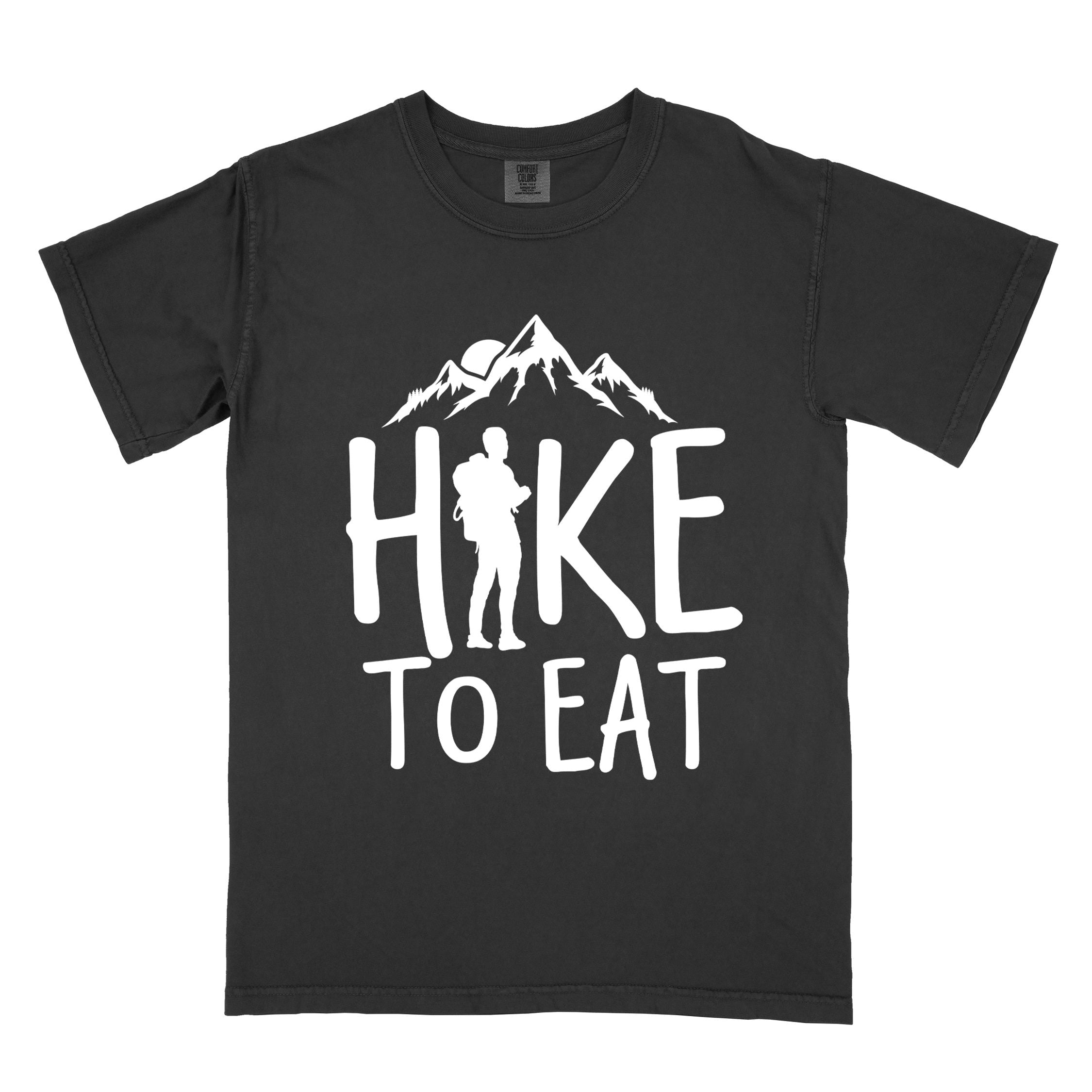 Black "Hike to Eat" colored statement tee with bold typography, mountains, birds, sunrise, perfect for food motivated individuals.