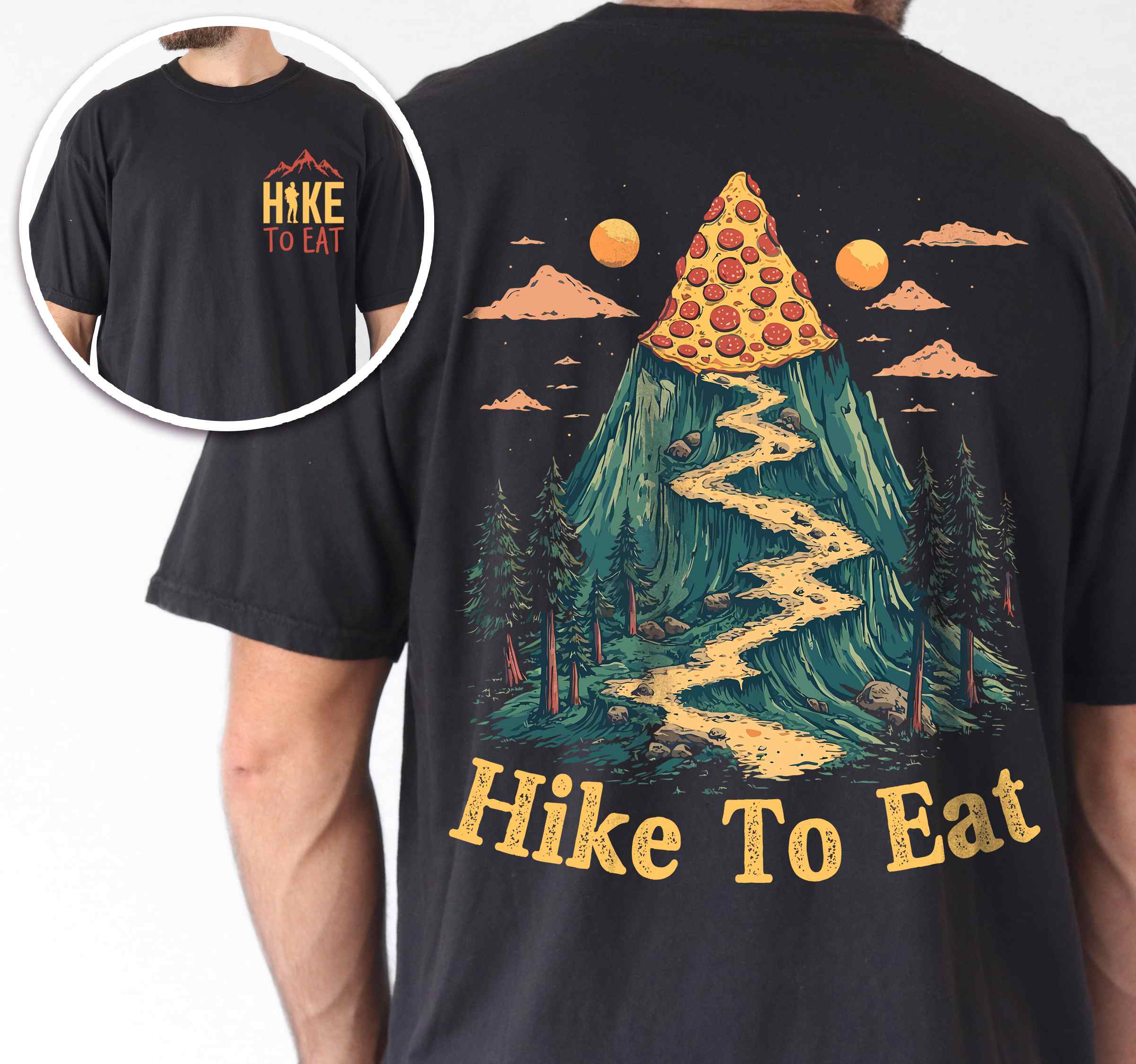 Man wearing black colored vintage tee with front and back design "Hike to Eat" text in cream lettering, mountains, birds, illustrated pizza slice mountain peak, and backpacker for pizza lovers.