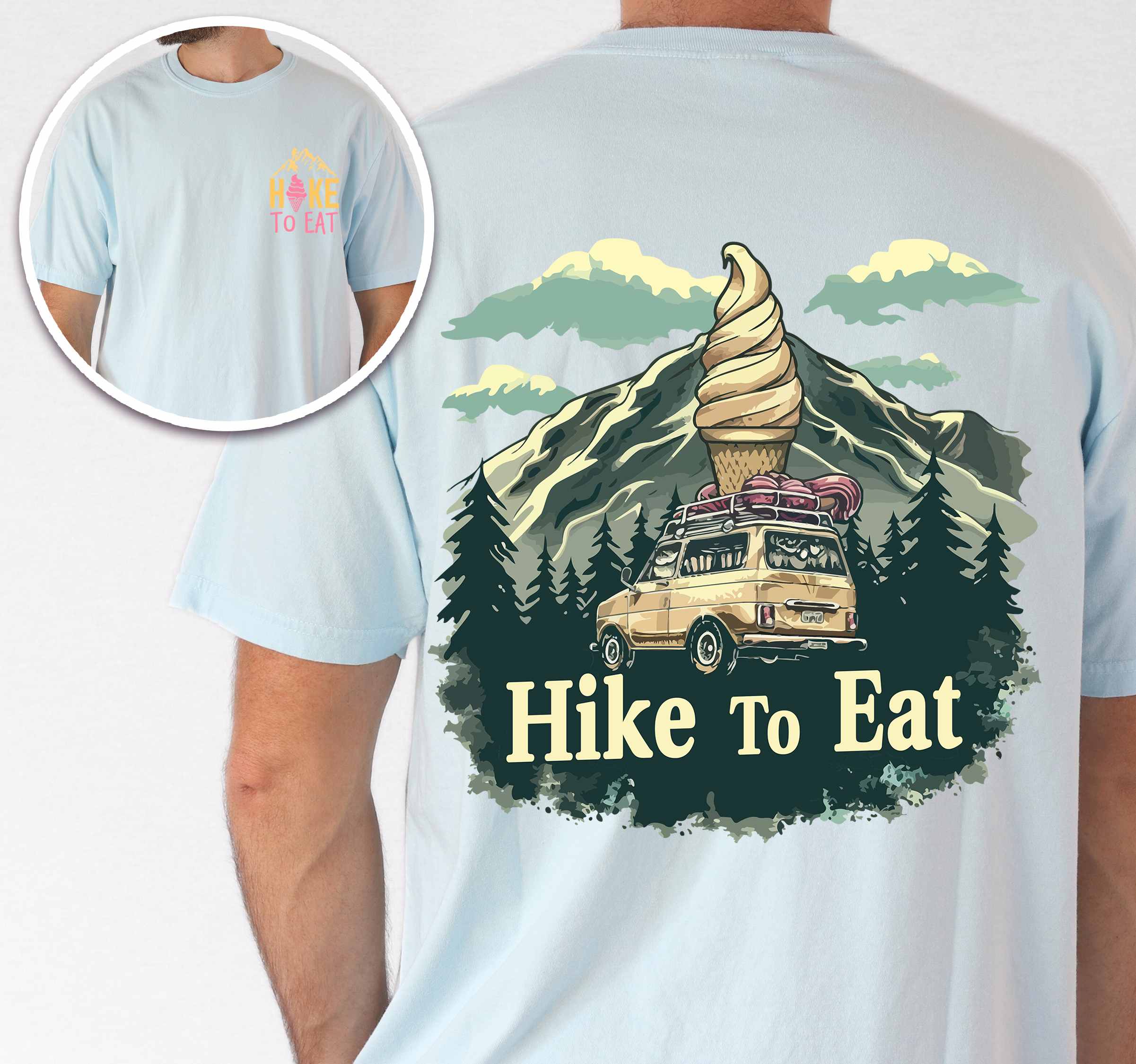 Man wearing chambray colored vintage tee with front and back design "Hike to Eat" text in cream lettering, mountains, birds, illustrated icecream cone, and backpacker for dessert lovers.