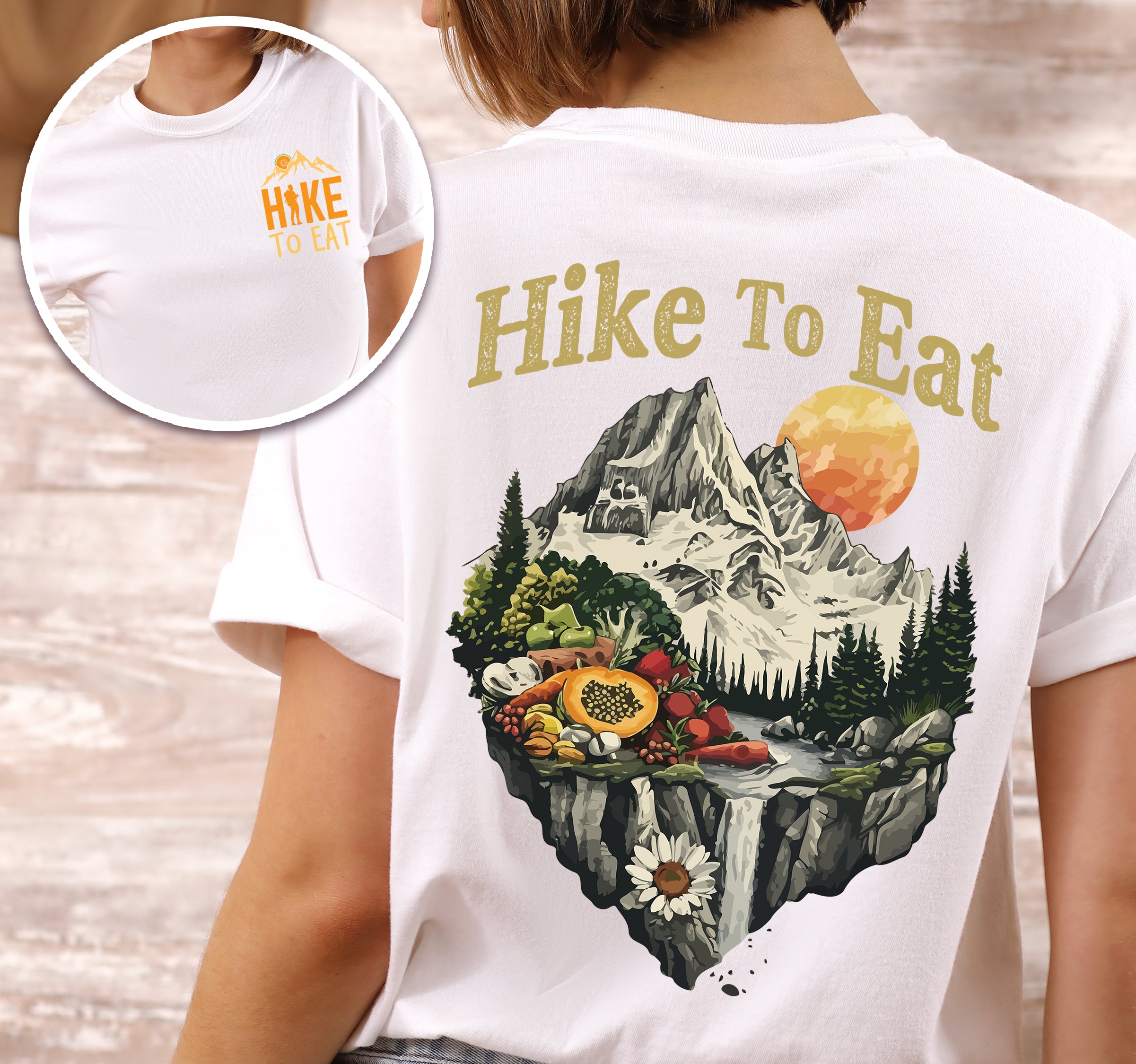White Hike to Eat t-shirt front and back view showing small chest logo and large back design featuring mountain landscape with waterfall and fresh food display including fruits and vegetables