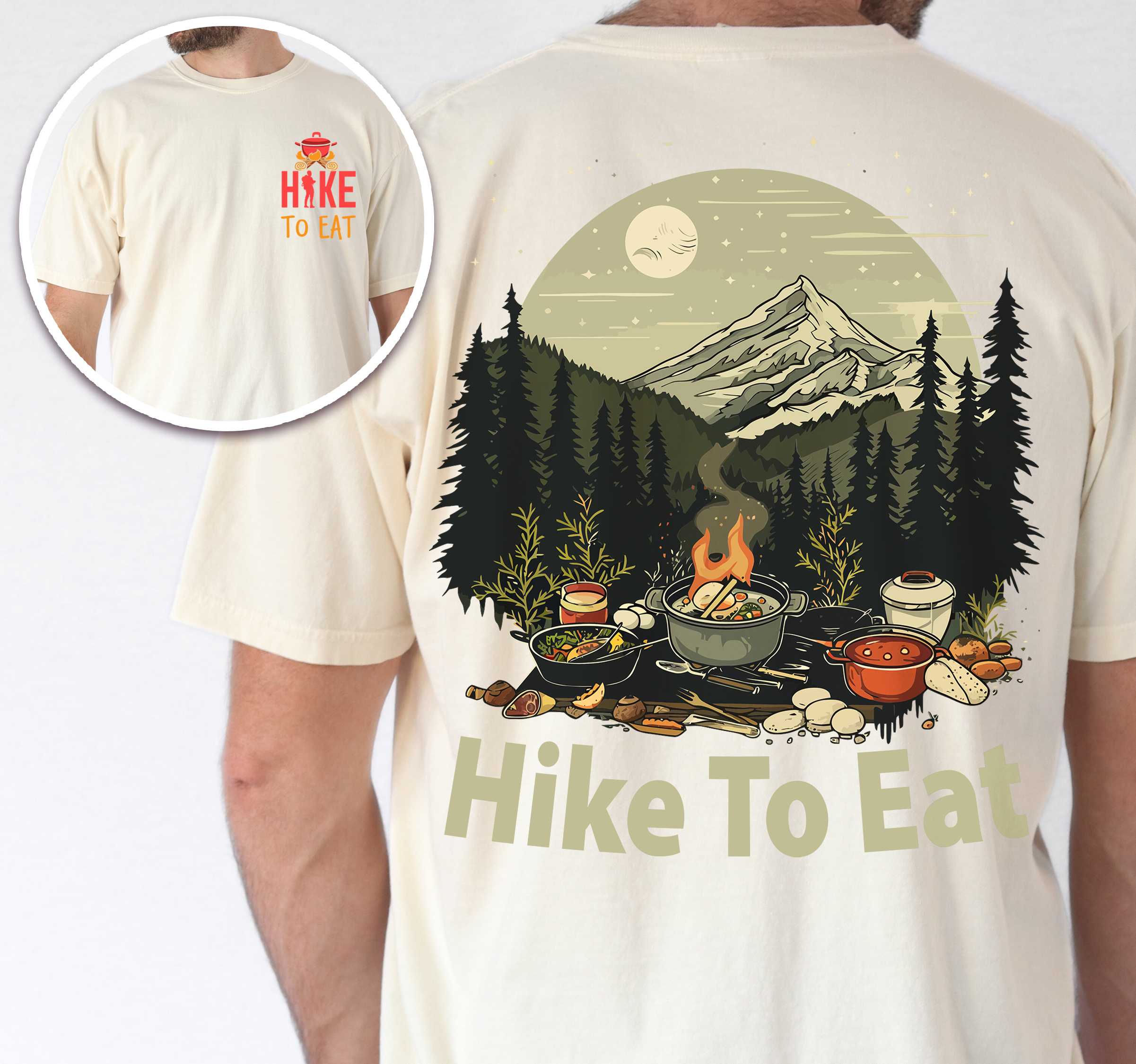 Man wearing ivory "Hike to Eat" text in bold lettering front and back design, mountains, birds, illustrated camping feast, and backpacker for campfire cooking enthusiasts.