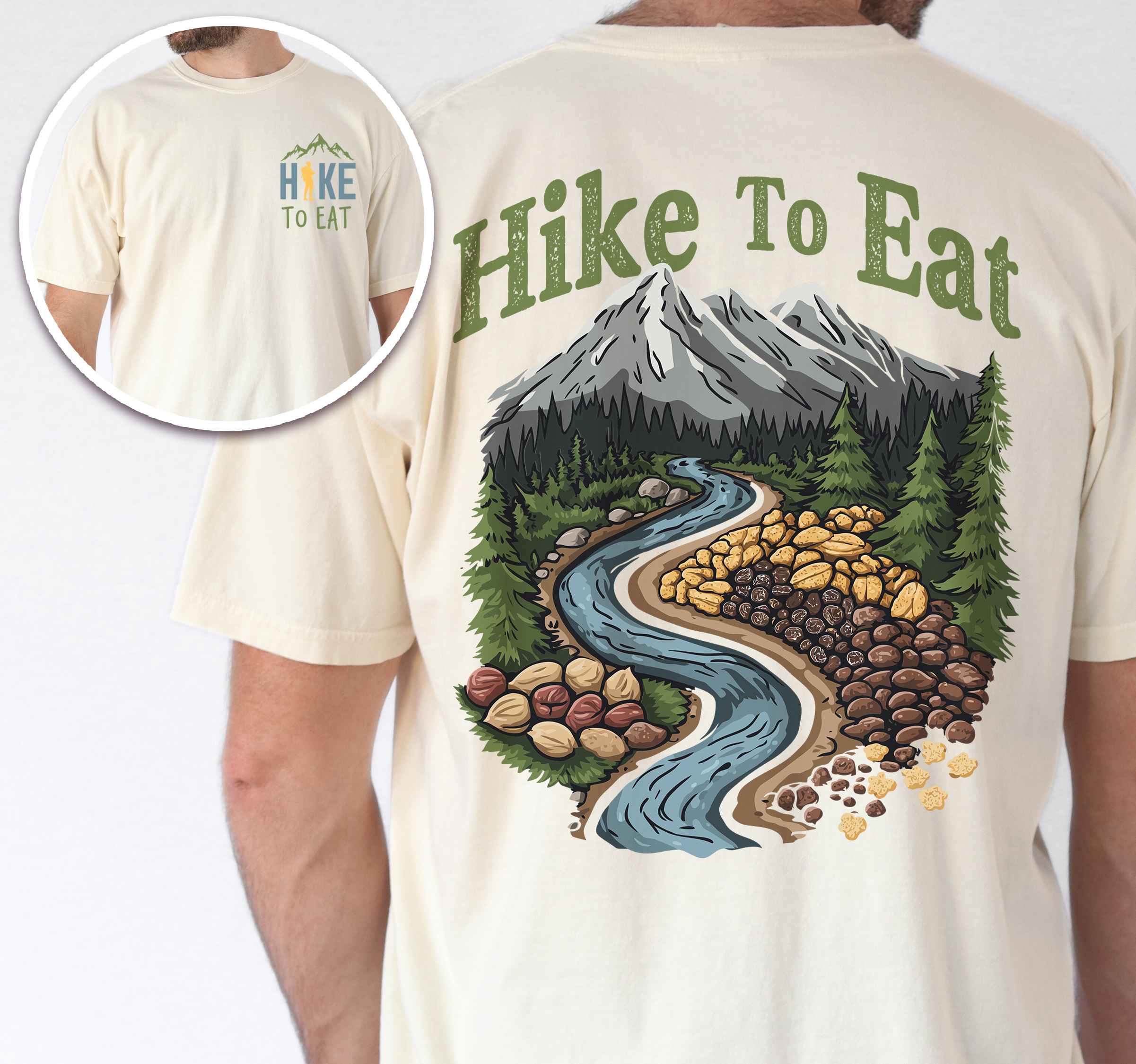 Man wearing ivory "Hike to Eat" text in bold lettering front and back design, mountains, birds, illustrated nuts and fruit trail mix, and backpacker for trail mix lover.