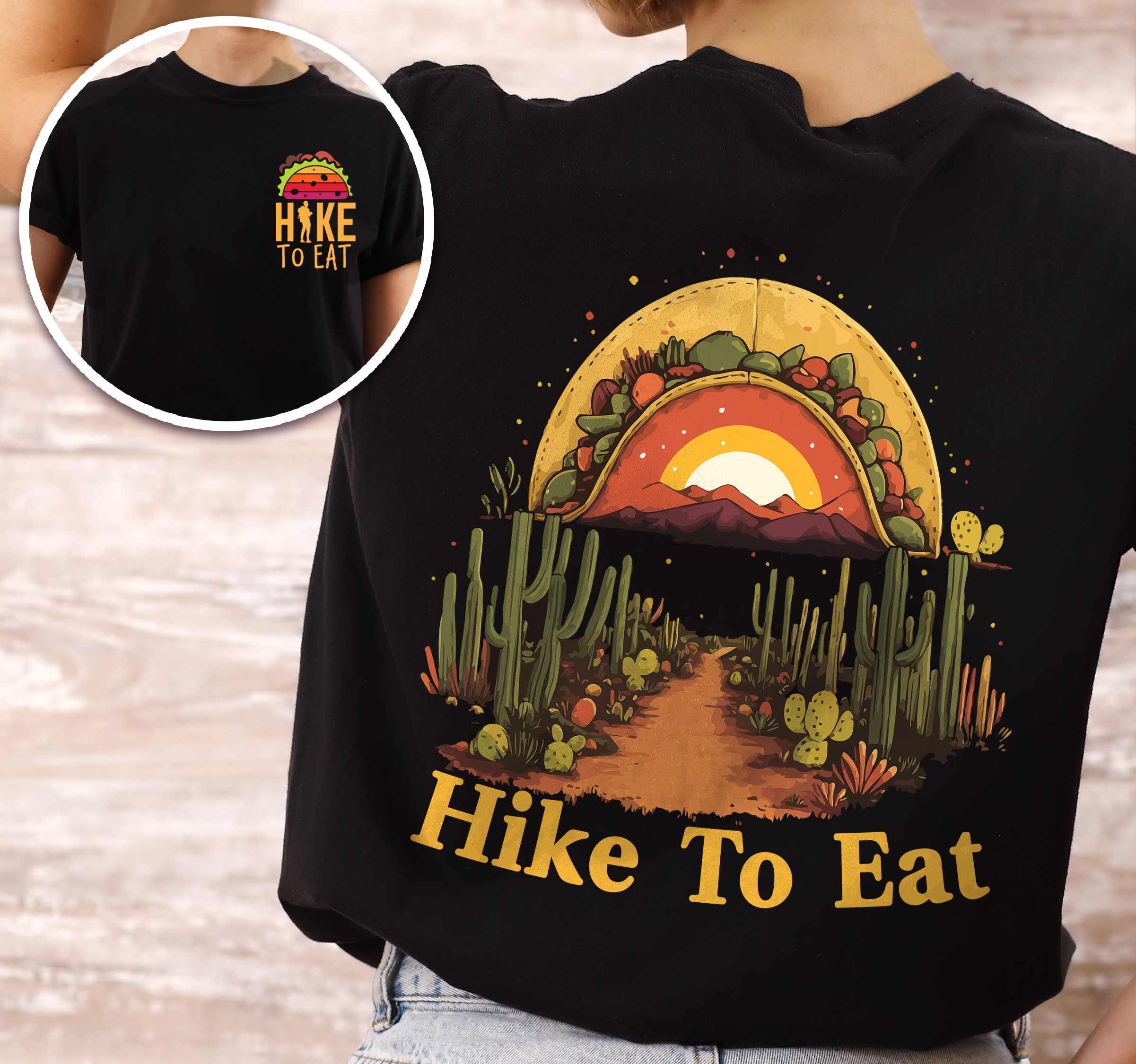 Woman wearing black "Hike to Eat" text in bold lettering back design, mountains, birds, illustrated sunset taco, and backpacker for taco enthusiasts.