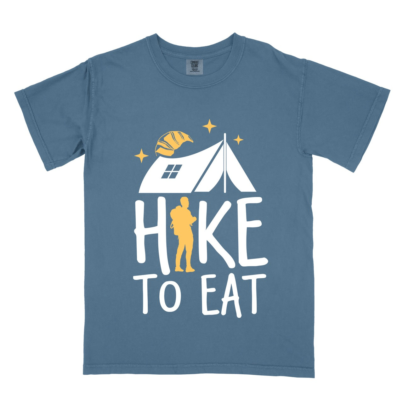 Blue Jean Hike to Eat brand philosophy vintage tee with white camping tent croissant moon stars character silhouette with backpack integrated into typography on Comfort Colors shirt for food motivated adventurers, outdoor enthusiasts and hikers