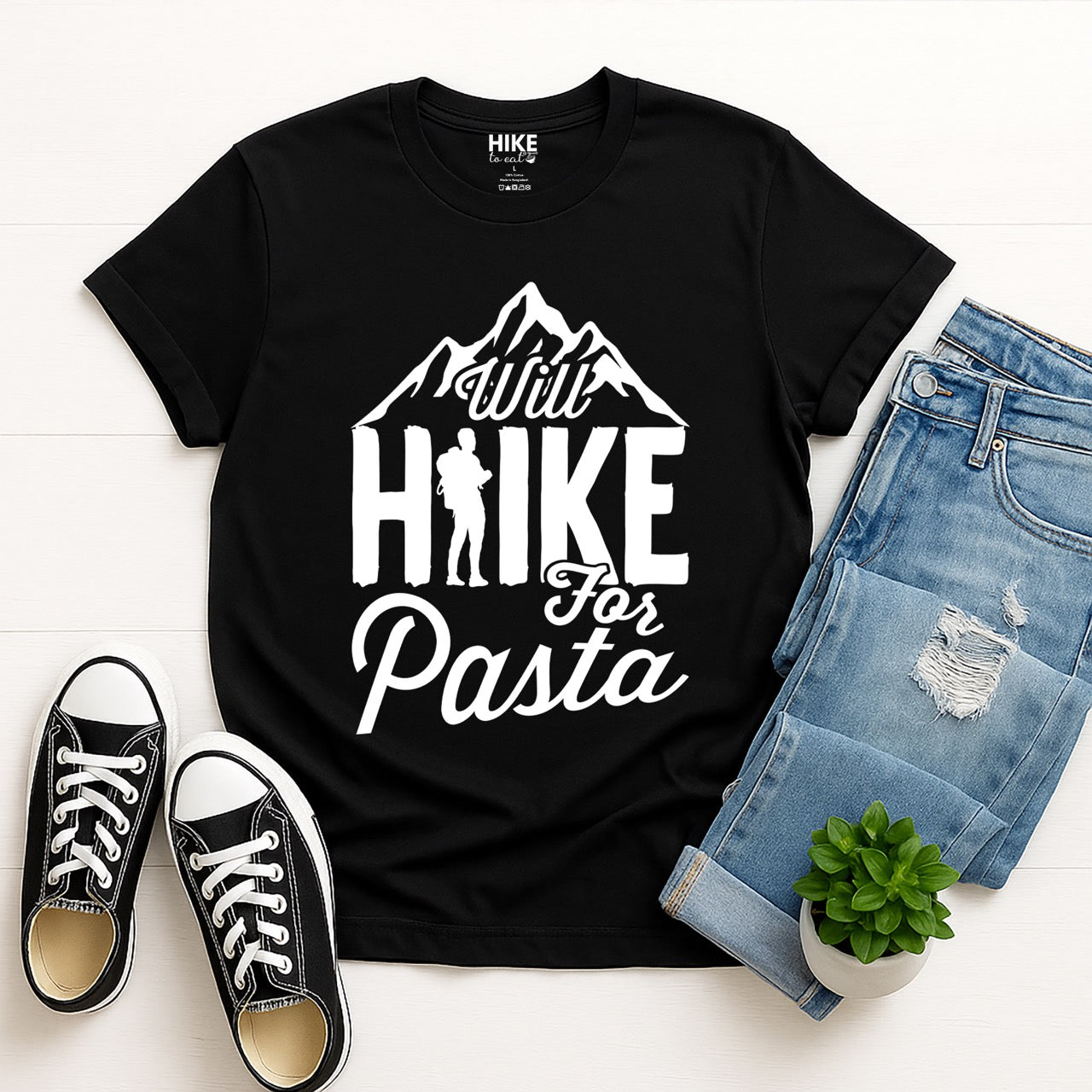 black Will Hike for Pasta statement tee with bold typography, mountain peaks, and backpacker silhouette for pasta devotees and hikers