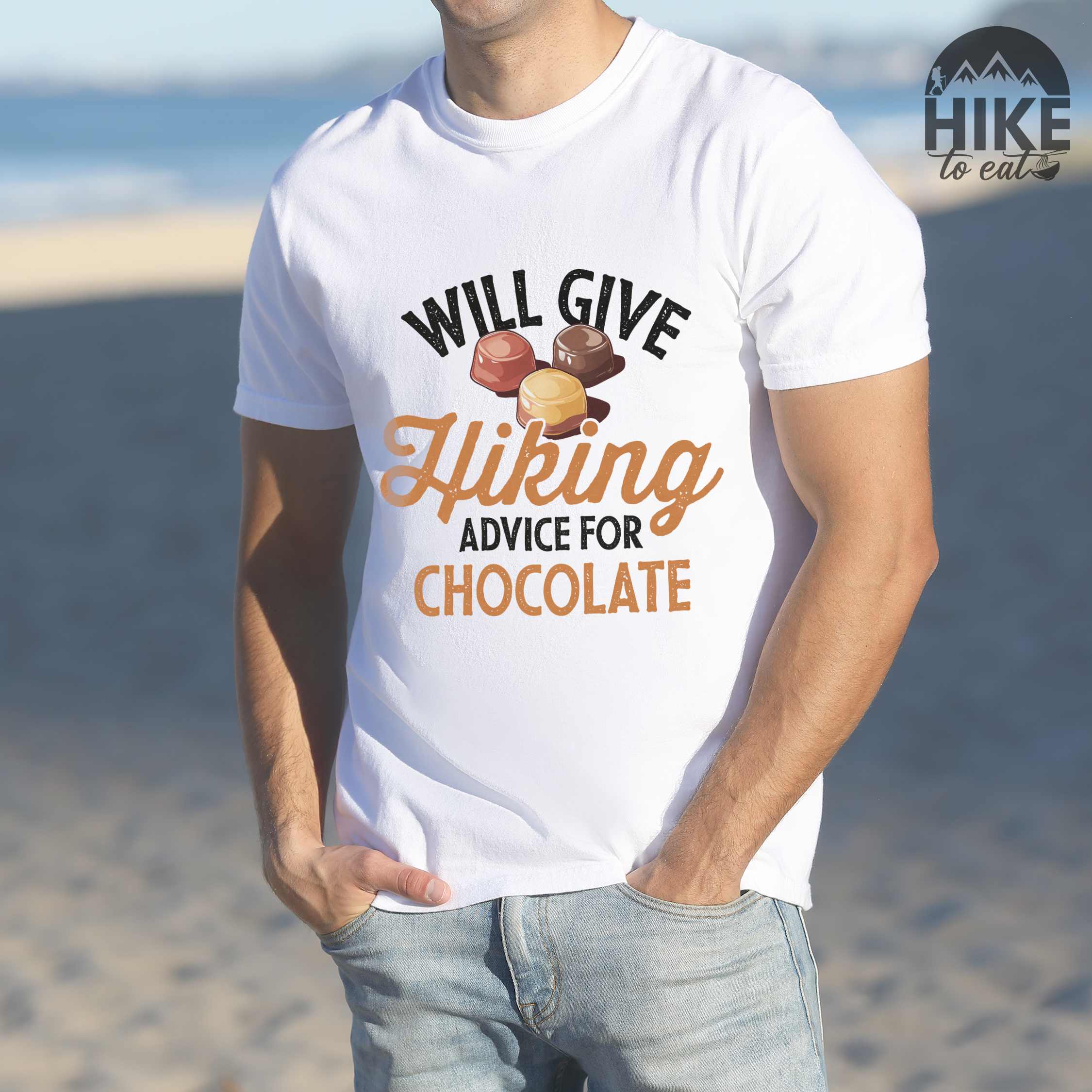White "Will give Hiking advice for Chocolate" colored vintage tee with bold typography, illustrated chocolate bonbons, perfect for the chocolate lovers.