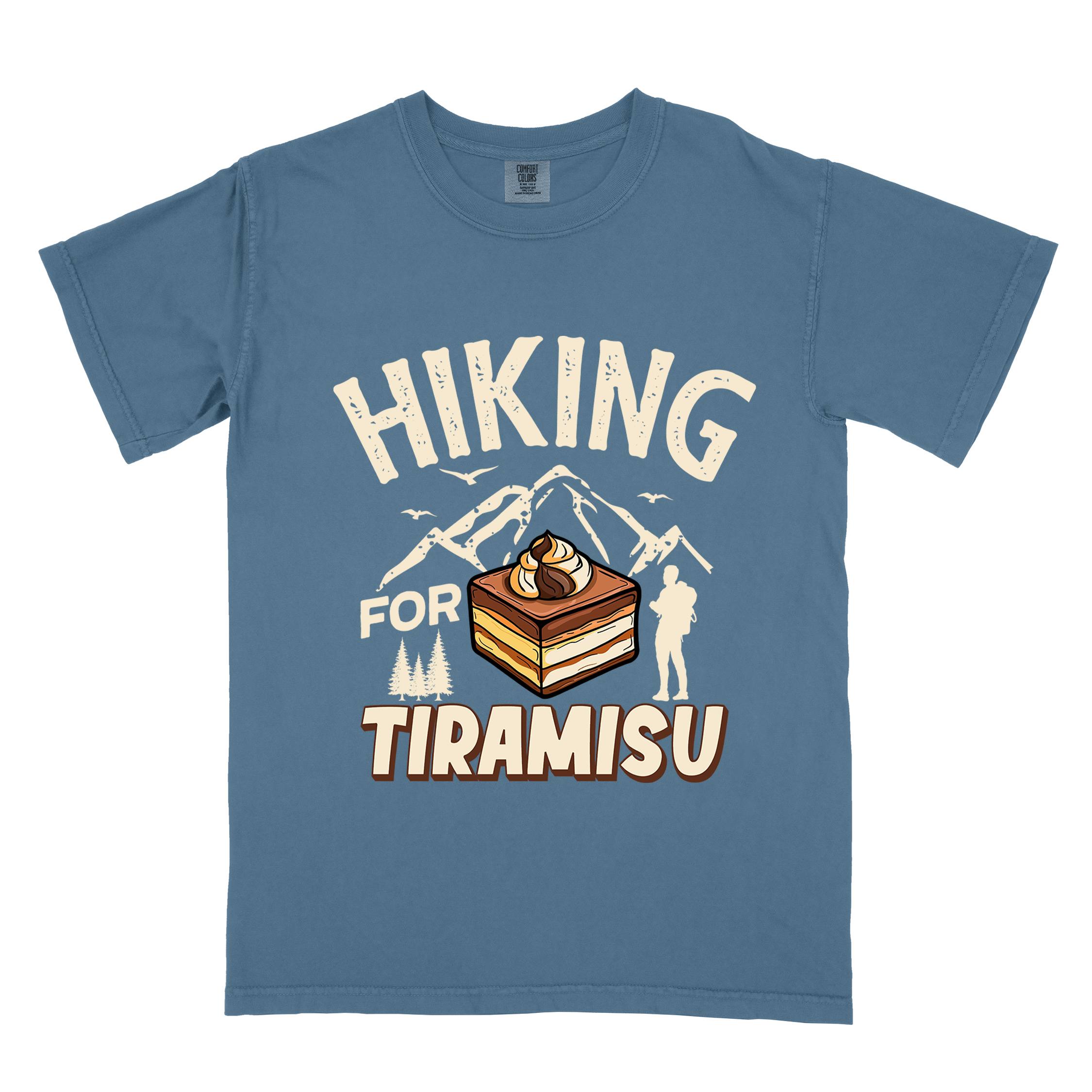 Blue jean "Hiking for Tiramisu" colored vintage tee with bold typography, mountains, illustrated a serving of Tiramisu, and backpackers with a sweet tooth.