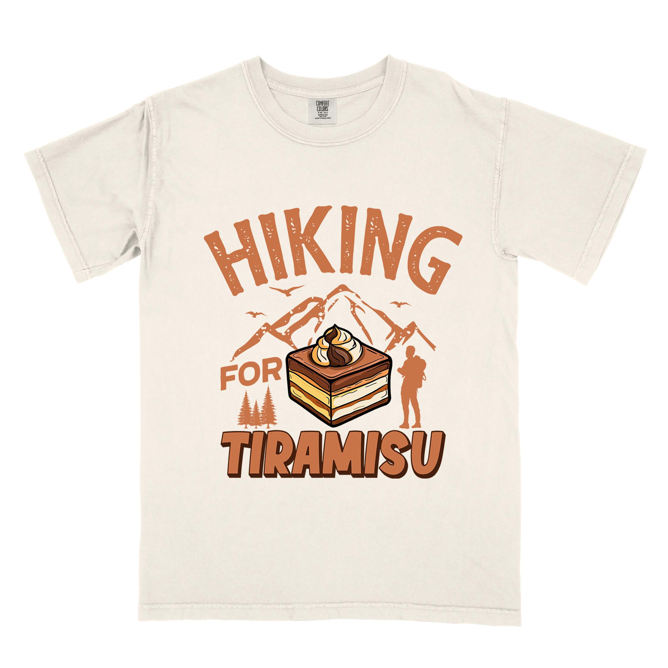 Ivory "Hiking for Tiramisu" colored vintage tee with bold typography, mountains, illustrated a serving of Tiramisu, and backpackers with a sweet tooth.