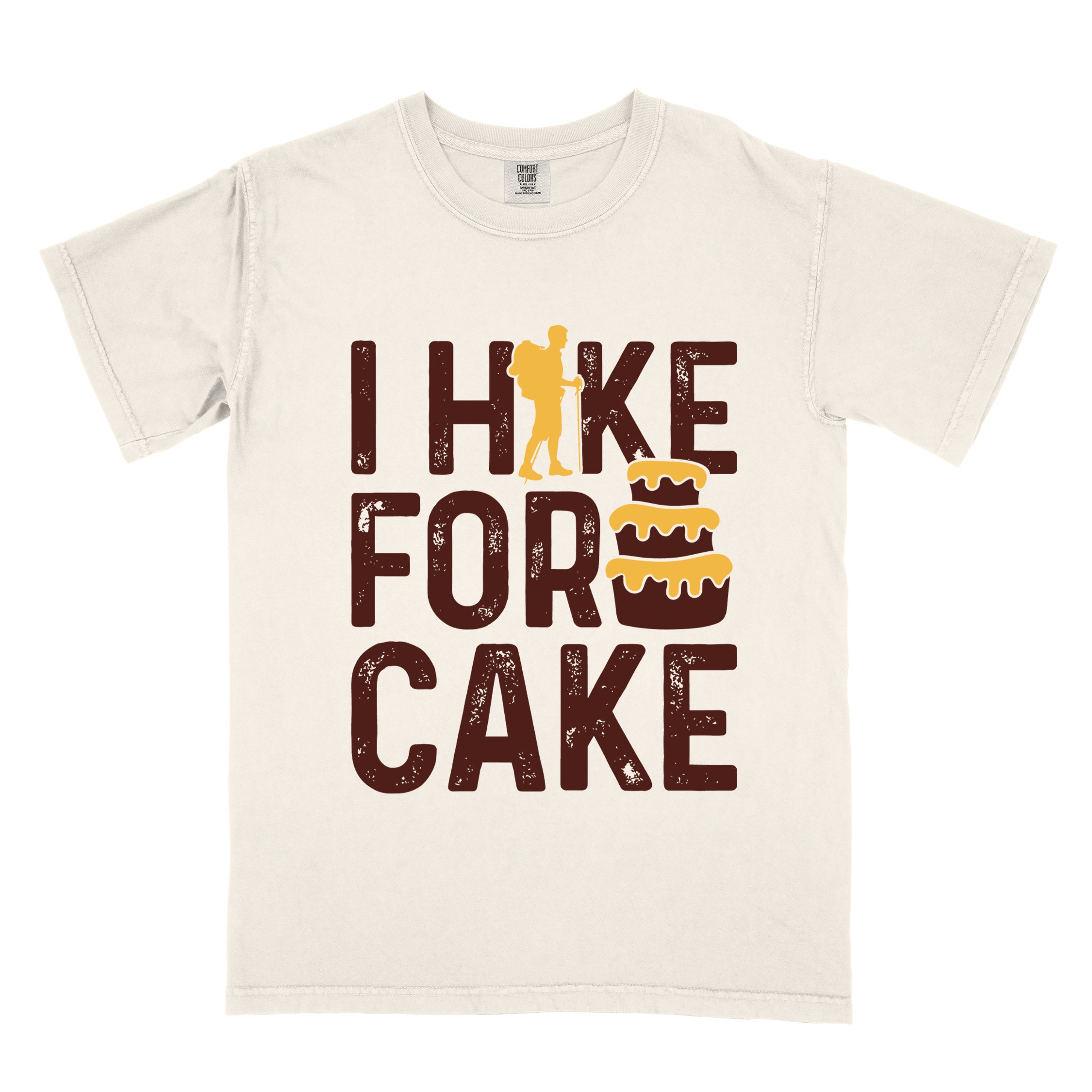 Ivory (beige) I Hike for Cake vintage statement tee with distressed typography, hiker silhouette, and layered cake illustration on Comfort Colors shirt for dessert-loving outdoor enthusiasts