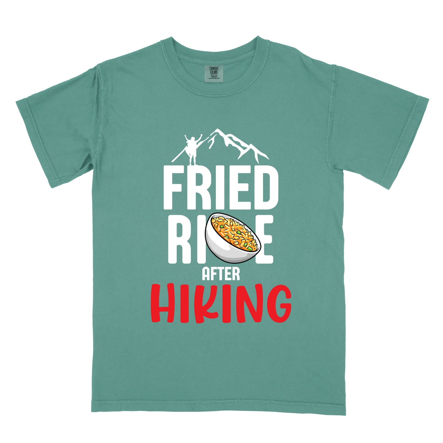 Light Green t-shirt with text "FRIED RICE AFTER HIKING". The top features white mountain silhouettes with a small hiker figure. "FRIED RICE" appears in large white letters with an illustration of a bowl of fried rice replacing the letter "C" in "RICE", tilted slightly to the right. The word "AFTER" is in small white text, and "HIKING" appears at the bottom in bold red letters.