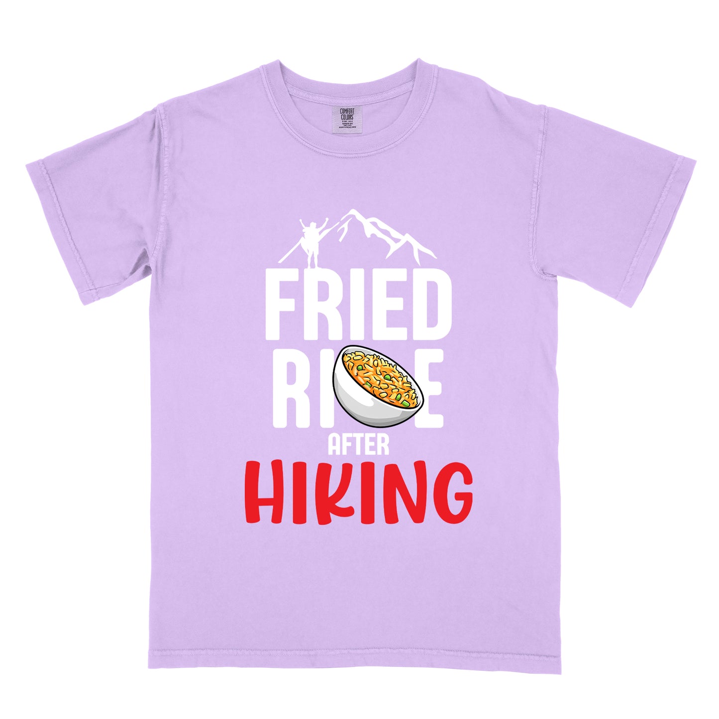 Orchid (Light Violet) t-shirt with text "FRIED RICE AFTER HIKING". The top features white mountain silhouettes with a small hiker figure. "FRIED RICE" appears in large white letters with an illustration of a bowl of fried rice replacing the letter "C" in "RICE", tilted slightly to the right. The word "AFTER" is in small white text, and "HIKING" appears at the bottom in bold red letters.