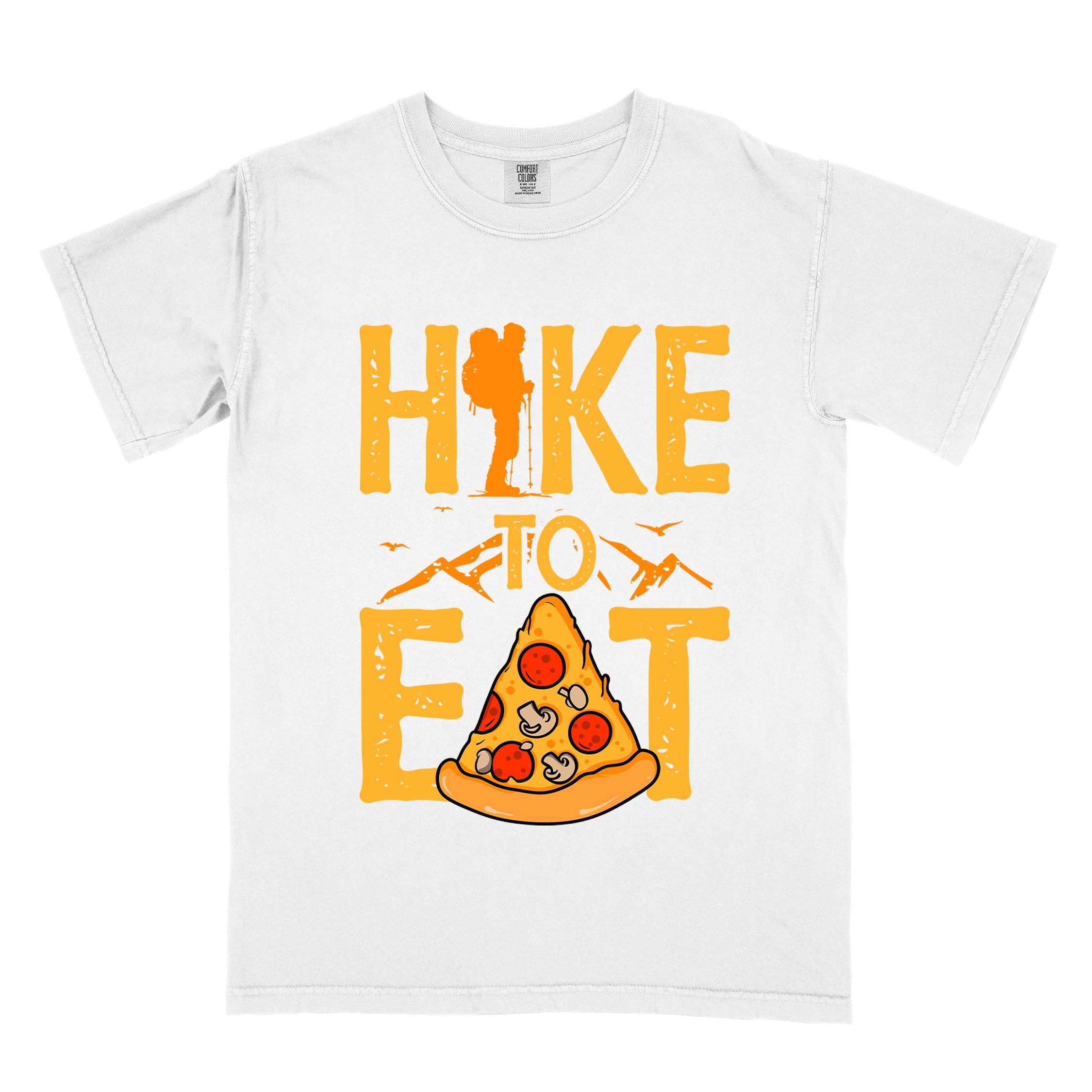 White "Hike to Eat" colored vintage tee with bold typography, birds, mountains, illustrated pizza slice, and backpacker for pizza lovers.