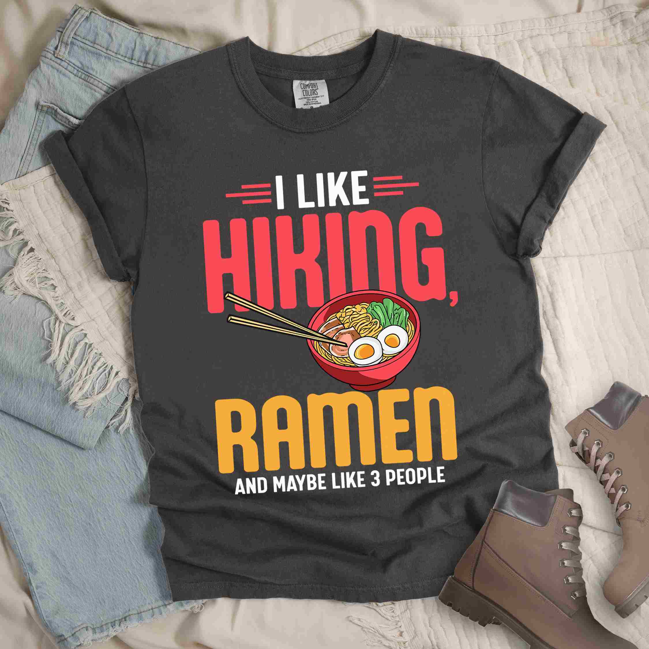 Pepper "I like Hiking, Ramen and maybe like three people" colored vintage tee with bold typography, and illustrated bowl of ramen for foodies