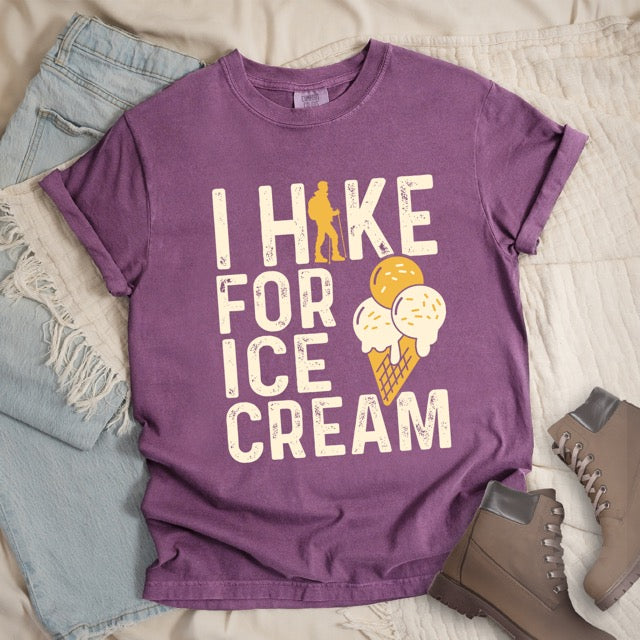 purple I Hike for Ice Cream statement tee with vintage distressed typography, hiker silhouette, and double-scoop ice cream cone illustration on Comfort Colors shirt for dessert-loving outdoor enthusiasts