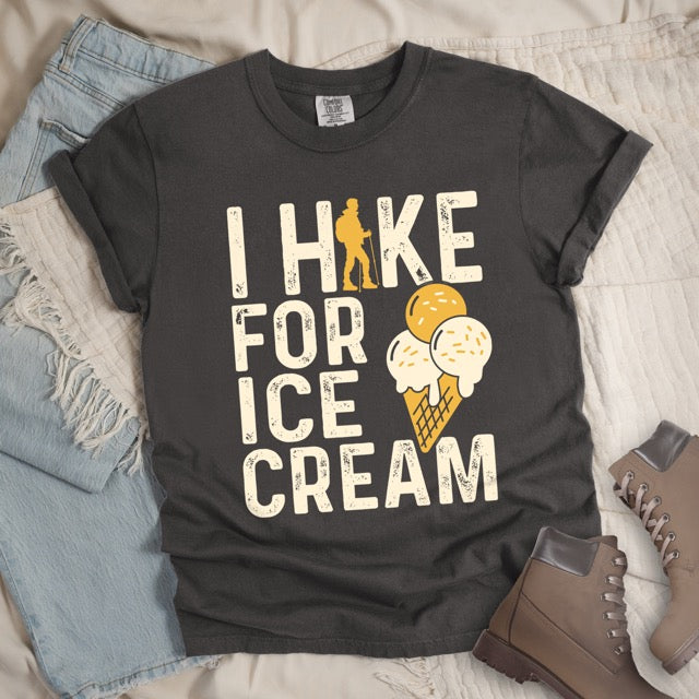pepper I Hike for Ice Cream statement tee with vintage distressed typography, hiker silhouette, and double-scoop ice cream cone illustration on Comfort Colors shirt for dessert-loving outdoor enthusiasts