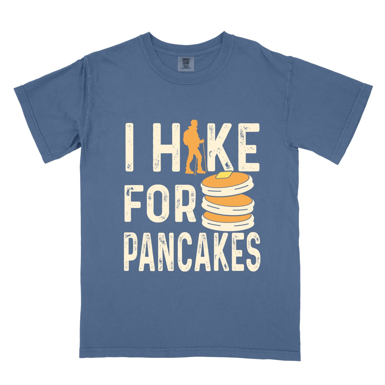 Blue Jean Pancake breakfast lover vintage tee I Hike for Pancakes with distressed cream typography character silhouette with trekking pole and illustrated stacked pancakes with butter on Comfort Colors shirt for brunch and food enthusiasts, hikers and foodies.