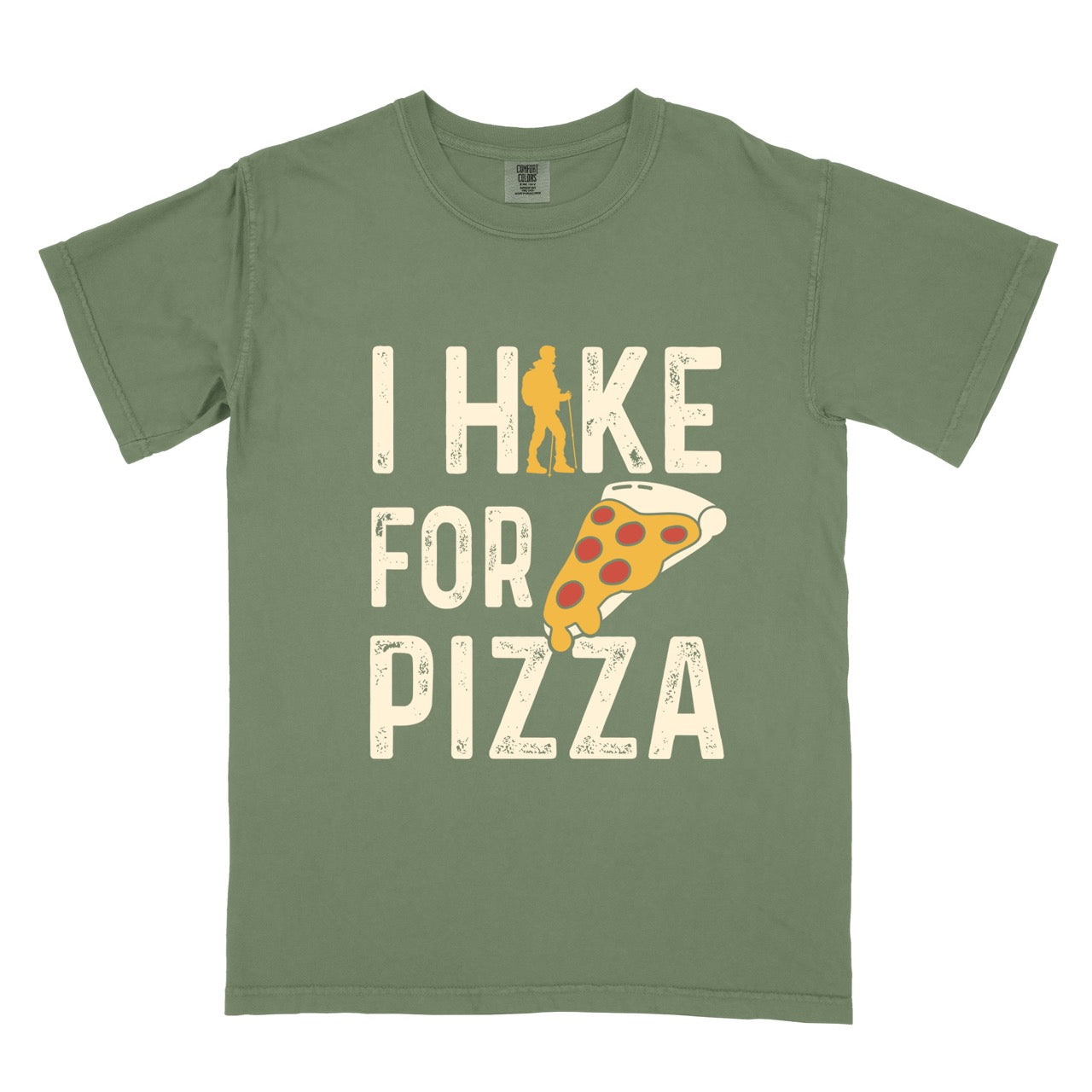 Moss (green) I Hike for Pizza graphic tee with distressed cream typography, pepperoni pizza slice illustration, and gold hiker silhouette on Comfort Colors shirt for Italian food enthusiasts and mountain trail lovers