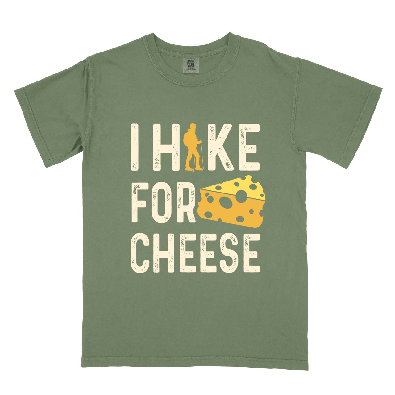 Moss (dark green) Cheese lover vintage tee I Hike for Cheese with distressed cream typography character silhouette with trekking pole and illustrated Swiss cheese wedge with holes on Comfort Colors shirt for dairy and food enthusiasts, hikers and foodies.